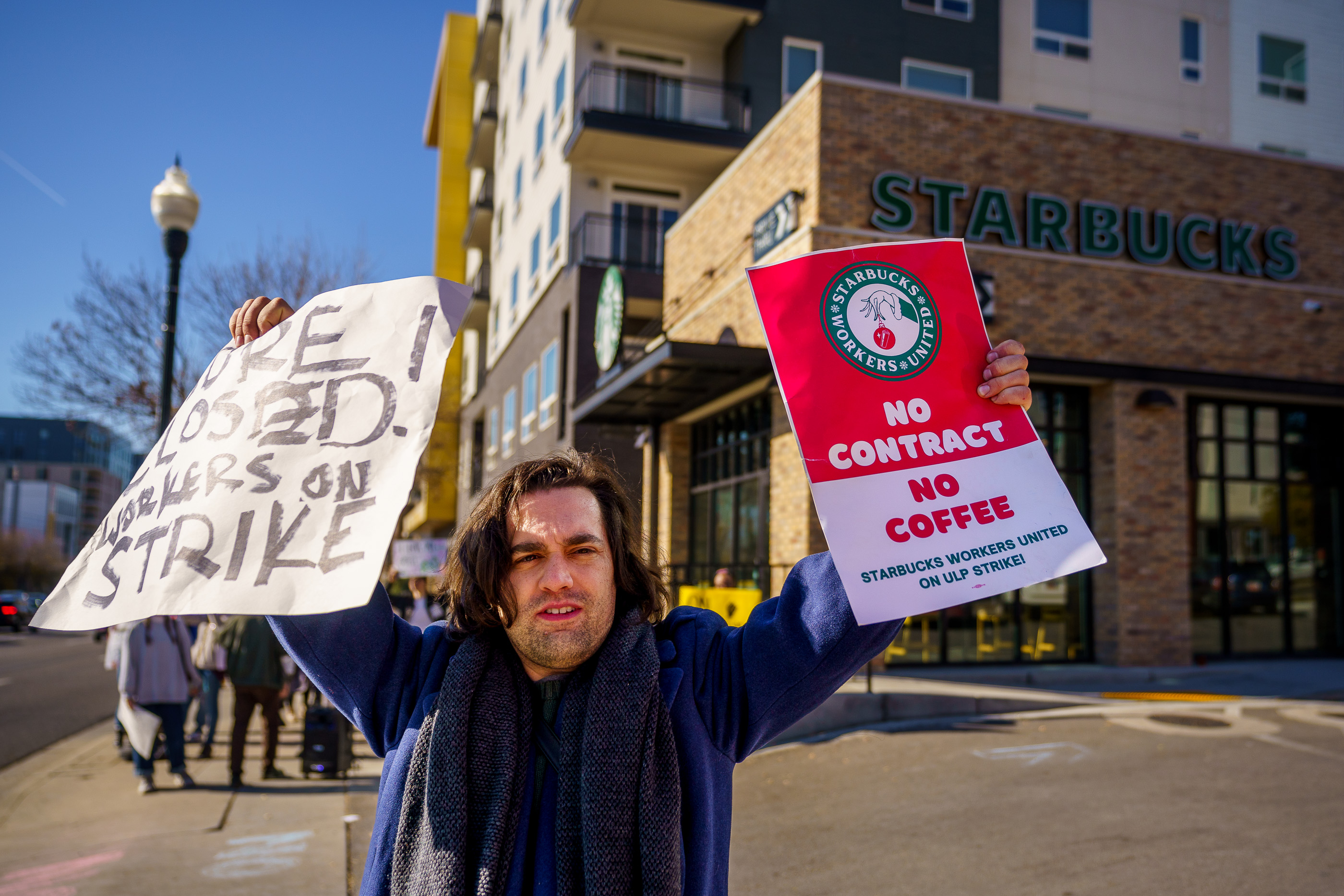 Thousands of Starbucks workers strike on Red Cup Day : NPR