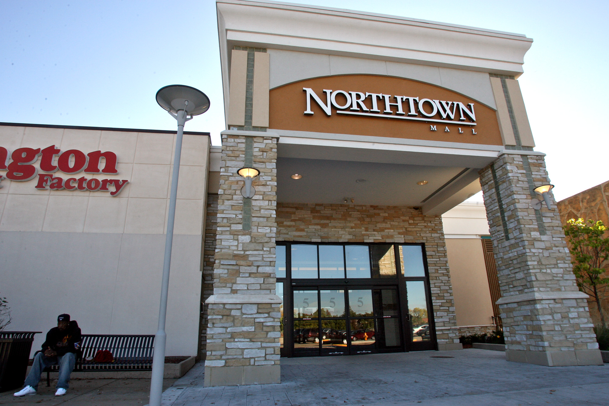 Man charged with firing gun outside Northtown Mall, where people inside were ordered to take cover