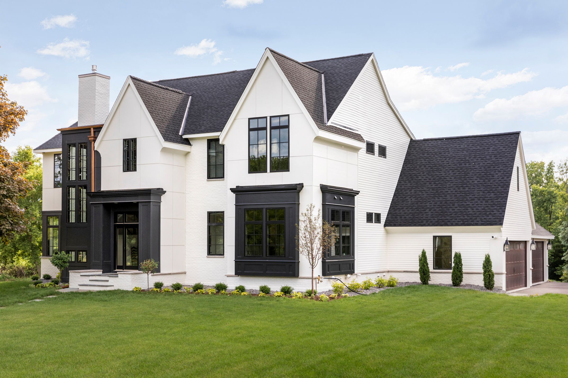 Lakeville home is a modern take on traditional English Tudor style, image size:2400x1600