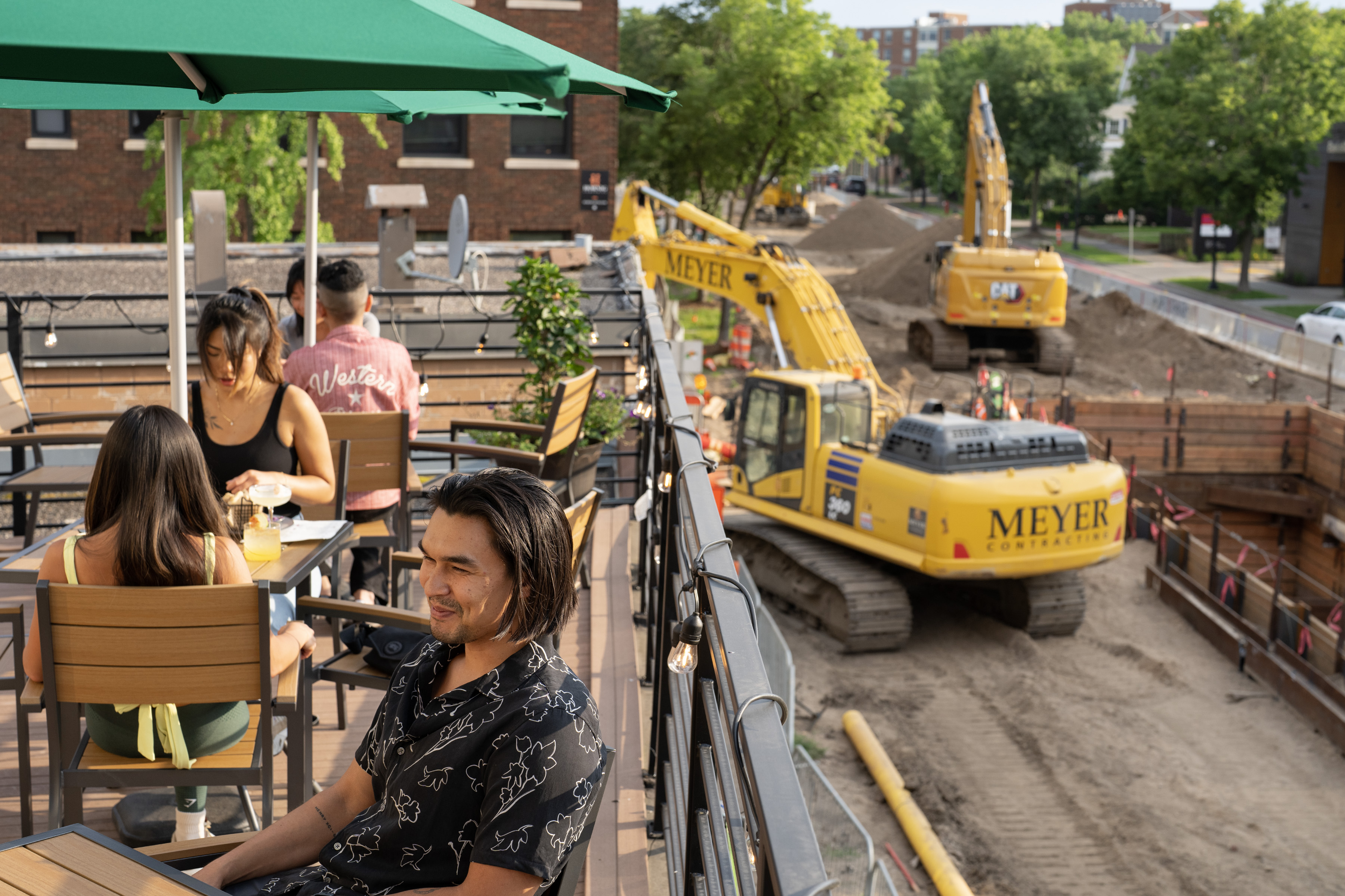 Uptown is down for now. These business owners are holding out hope.