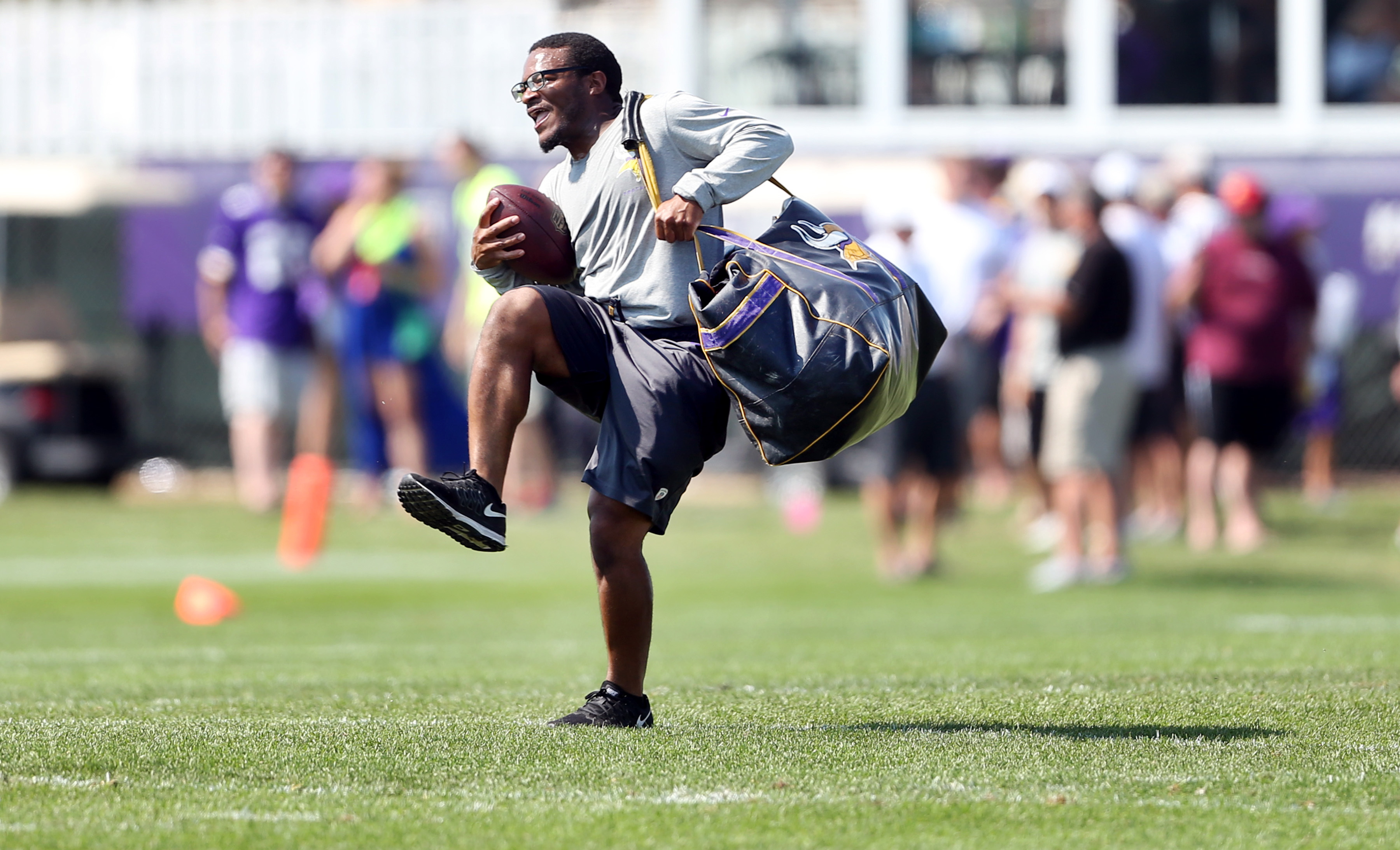 A purple blur keeps Vikings camp rolling along