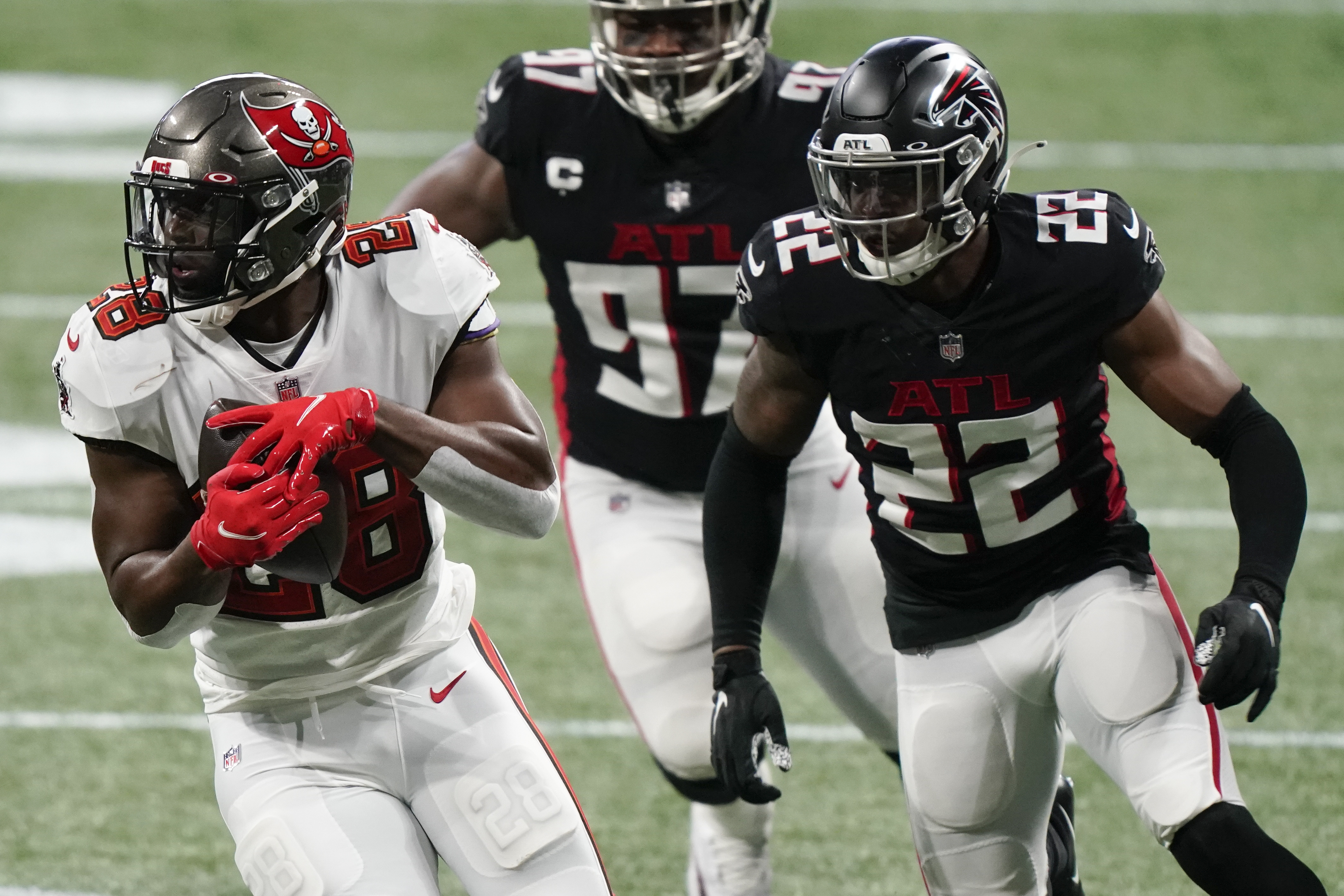 Tampa Bay Buccaneers wide receiver Scott Miller (10) runs the ball during  the second half of an NFL football game against the Atlanta Falcons,  Sunday, Dec. 20, 2020, in Atlanta. The Tampa