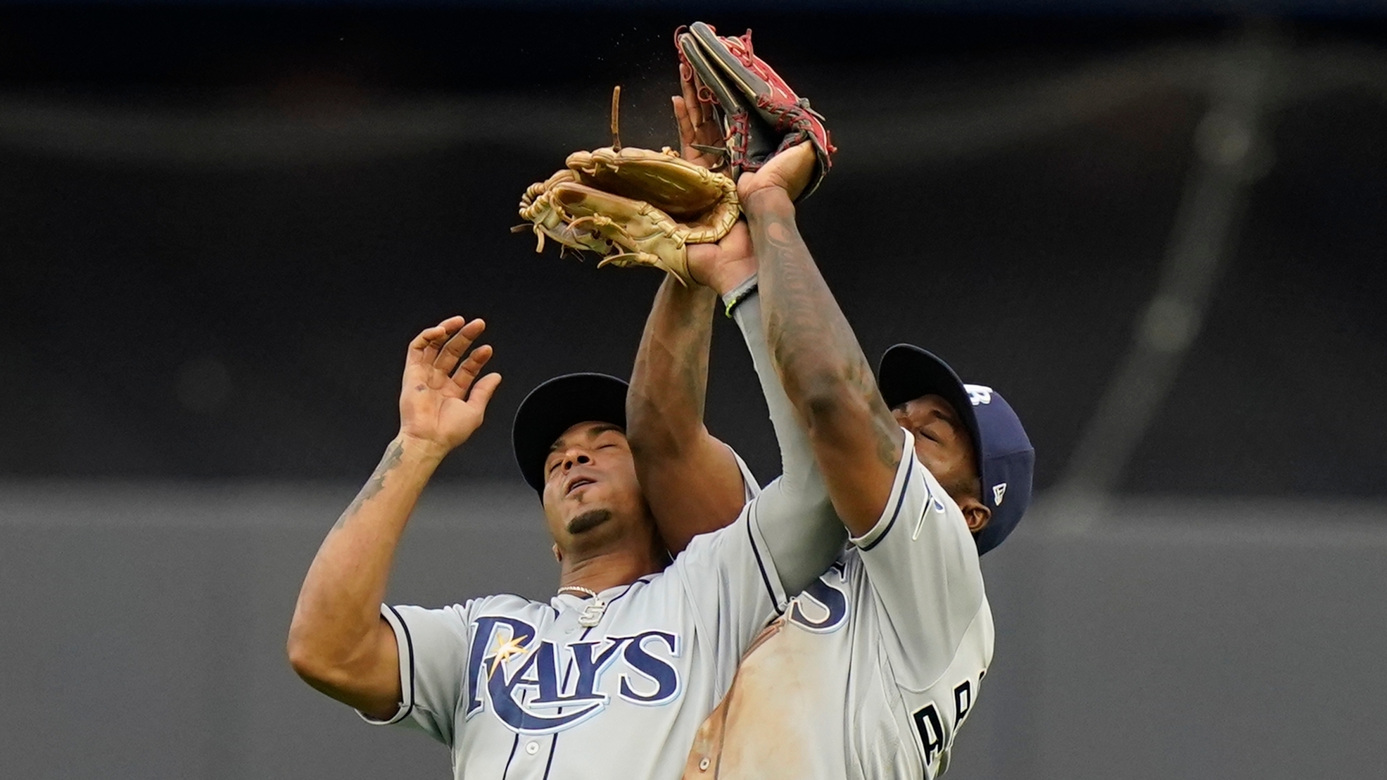 Gio Urshela with the CATCH OF THE YEAR! Flies into Rays dugout and