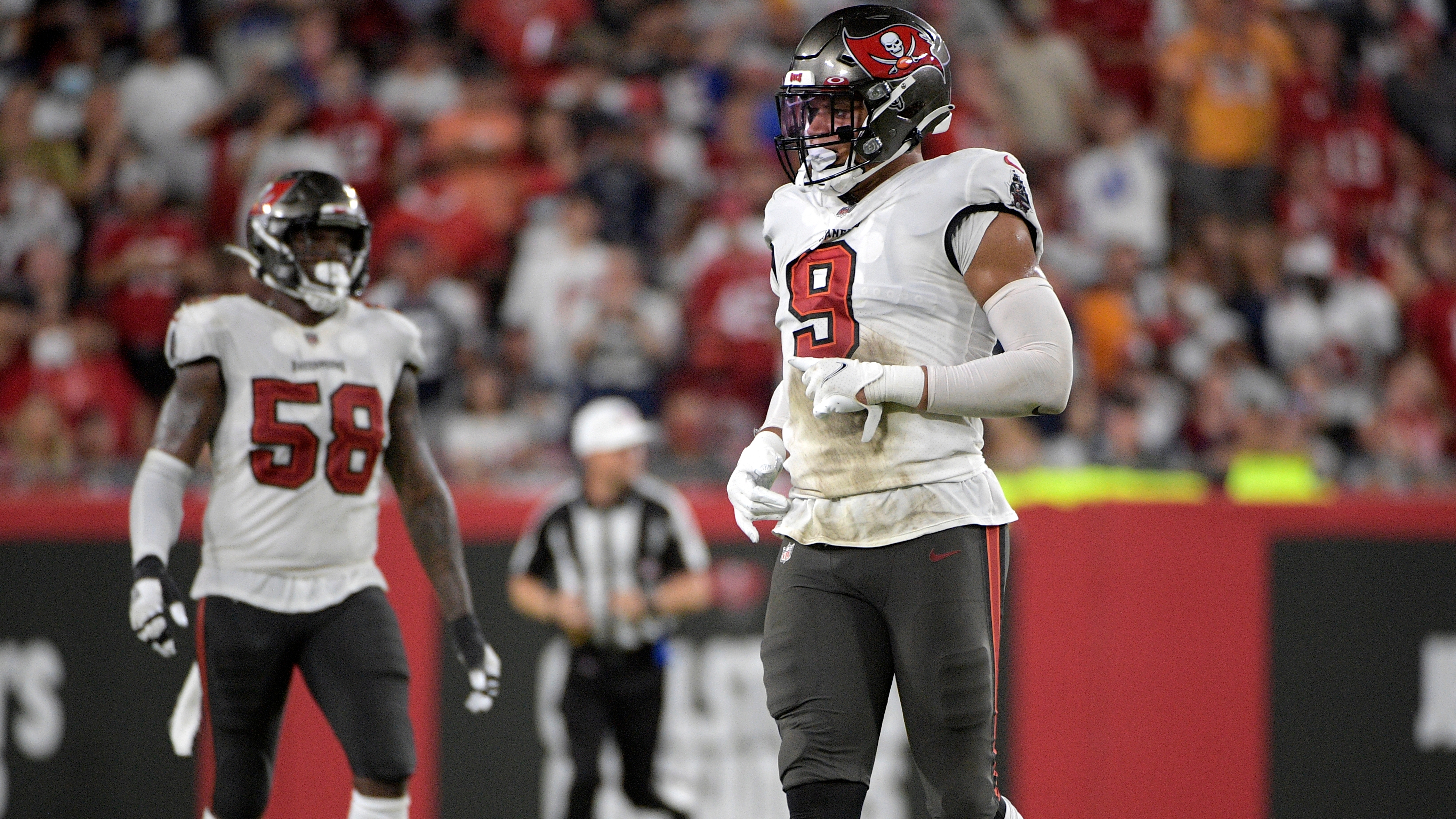 Tampa Bay Buccaneers linebacker Joe Tryon-Shoyinka (9) reacts after  defeating the New England Patriots in an NFL football game, Sunday, Oct. 3,  2021, in Foxborough, Mass. (AP Photo/Greg M. Cooper Stock Photo 