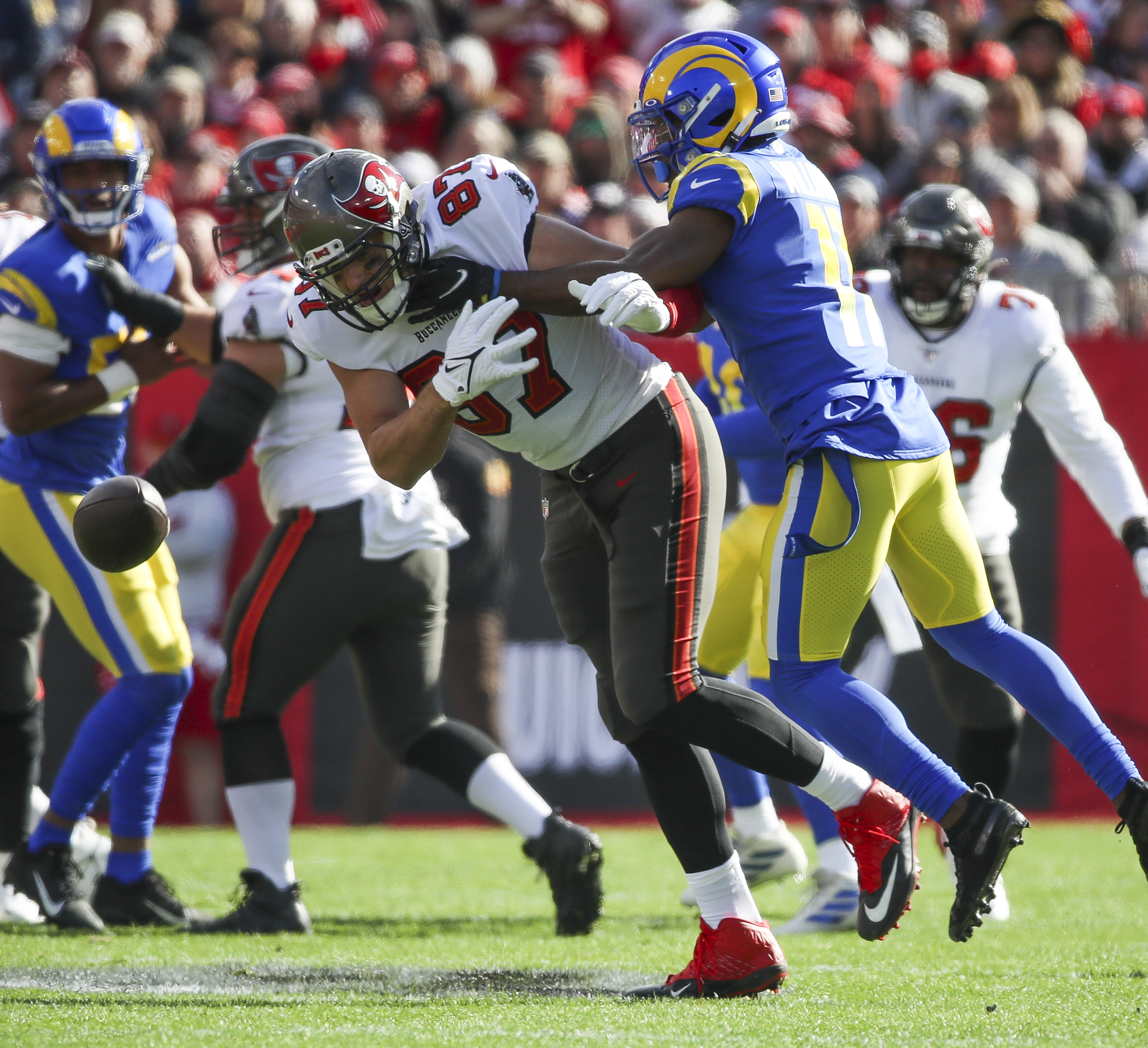 Tampa Bay Buccaneers guard Alex Cappa (65) reacts to the snap during a NFL  divisional playoff f …