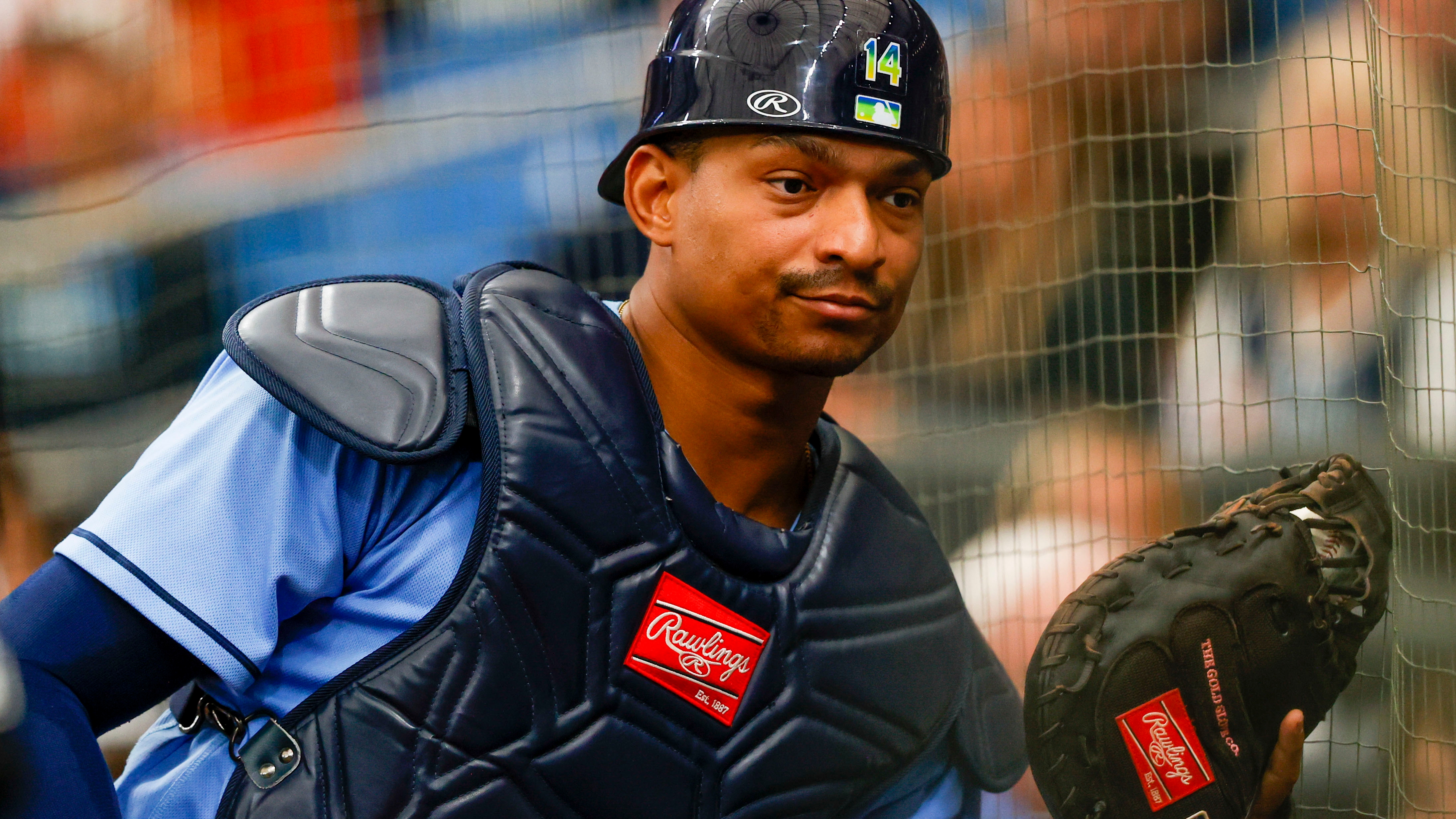 Tampa Bay Rays catcher Christian Bethancourt, right, leans away as