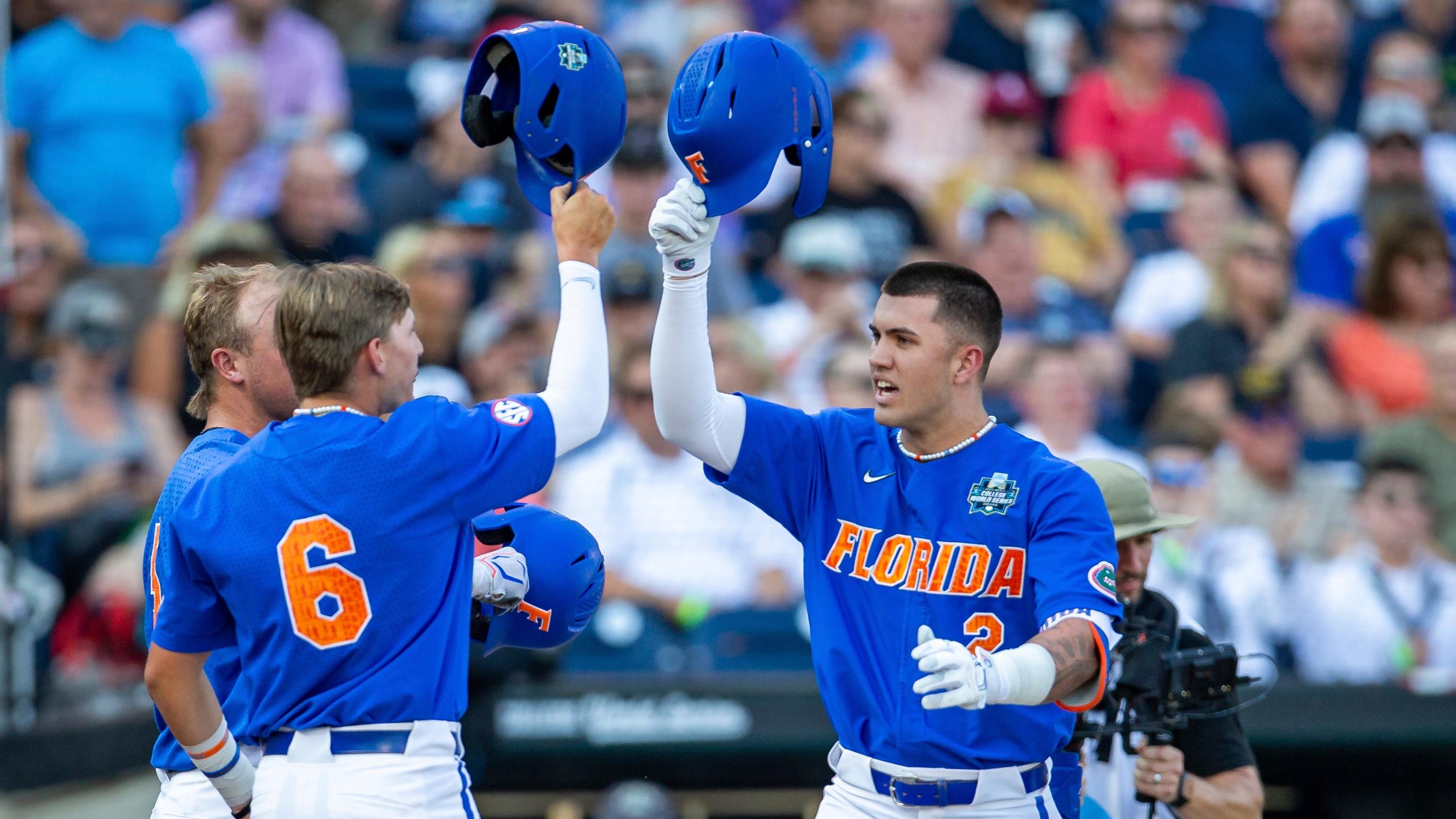 Florida catcher BT Riopelle (15) runs to first base during an NCAA