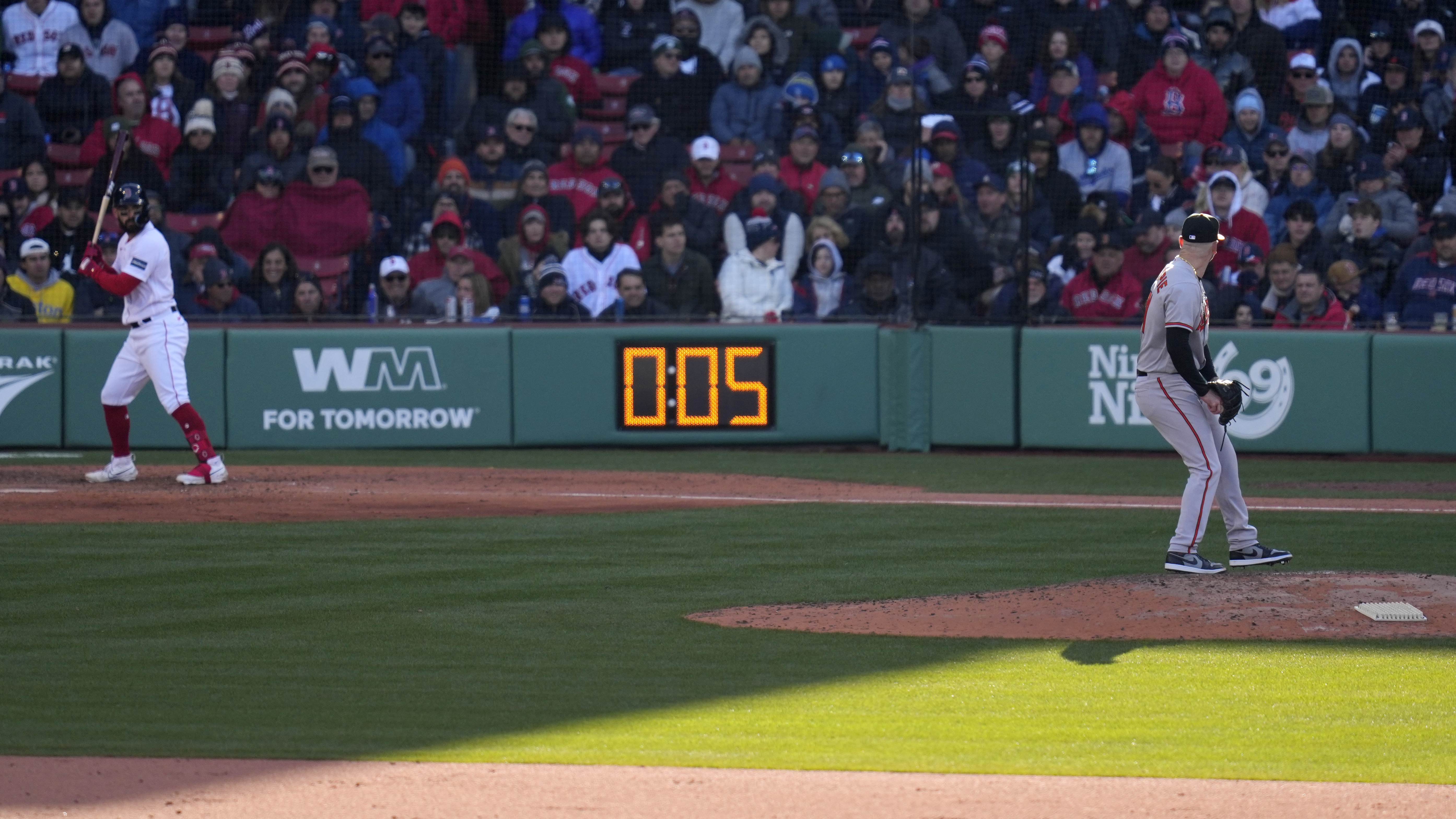 Major League Baseball players find less time for small talk with pitch clock