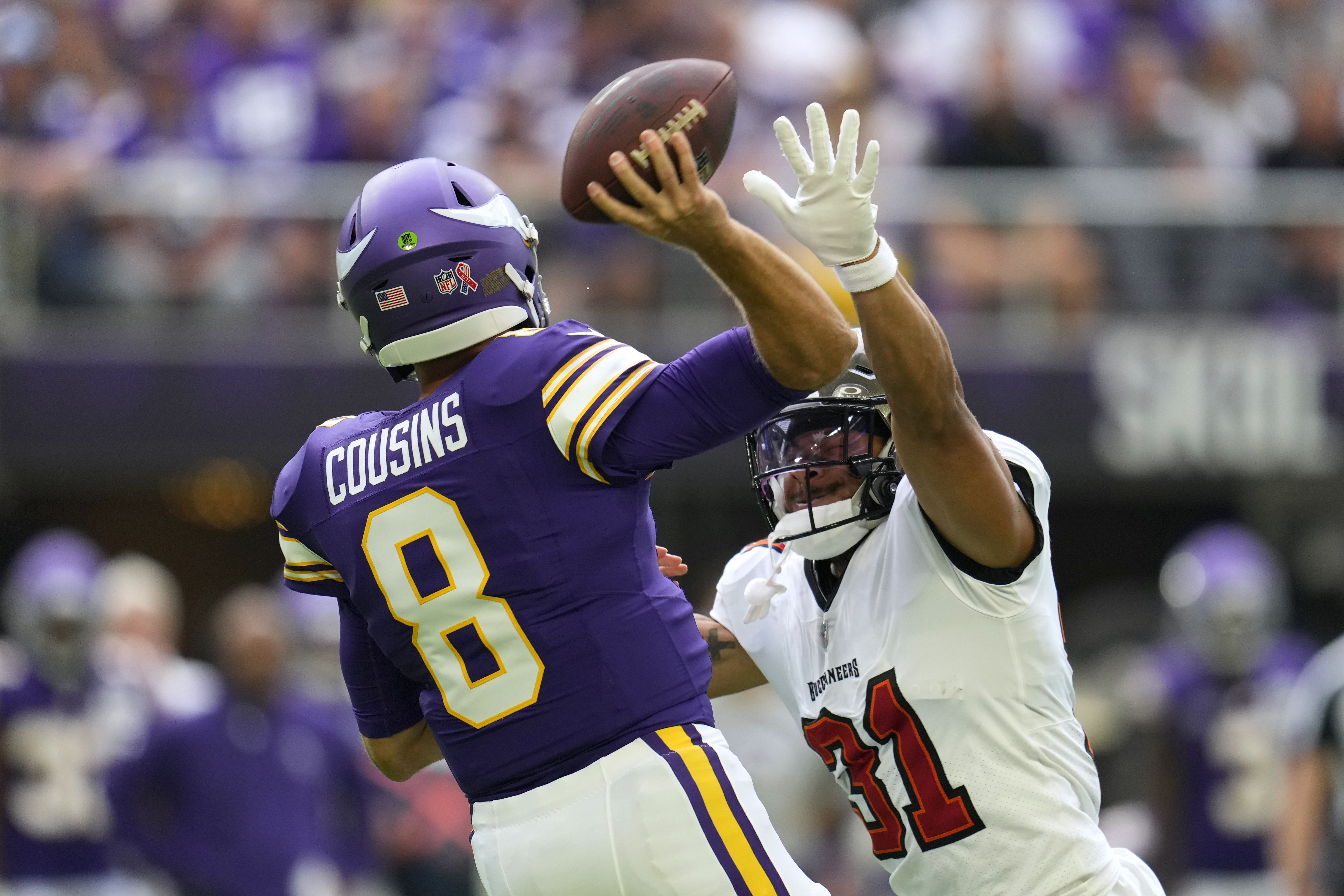 Minnesota Vikings cornerback Antoine Winfield walks off the field