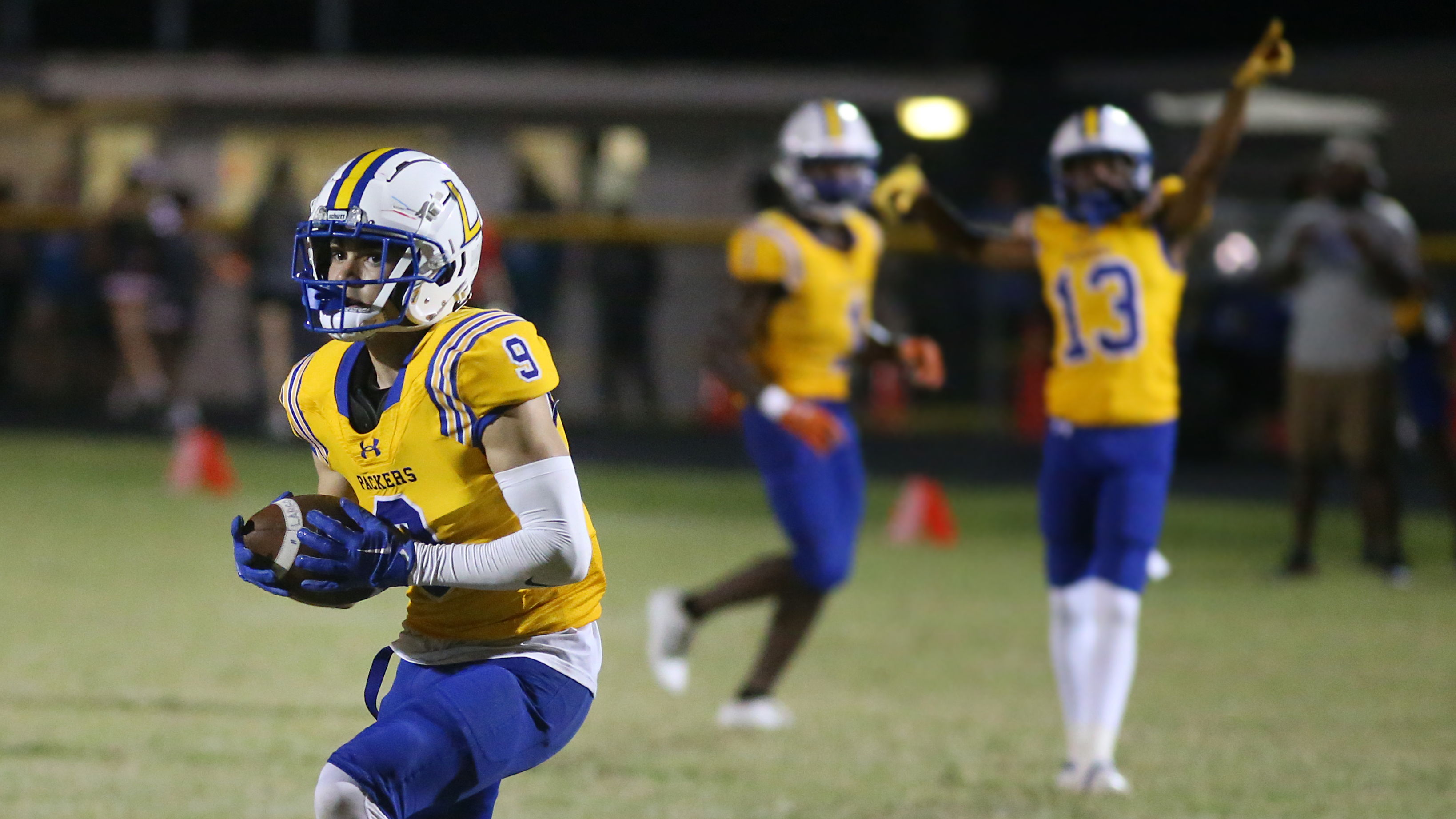 Packers surprise high school football teams with new helmets