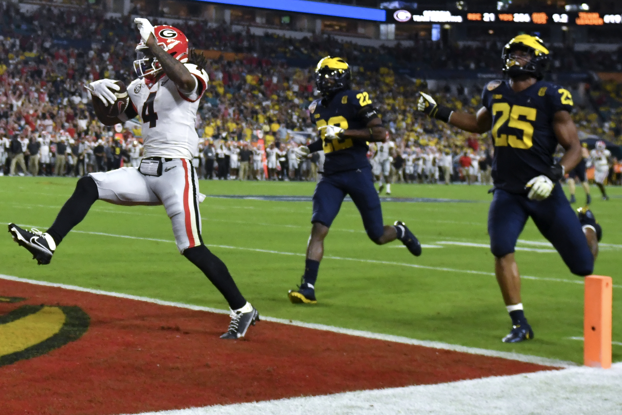 Georgia vs georgia. Команда Michigan Football.