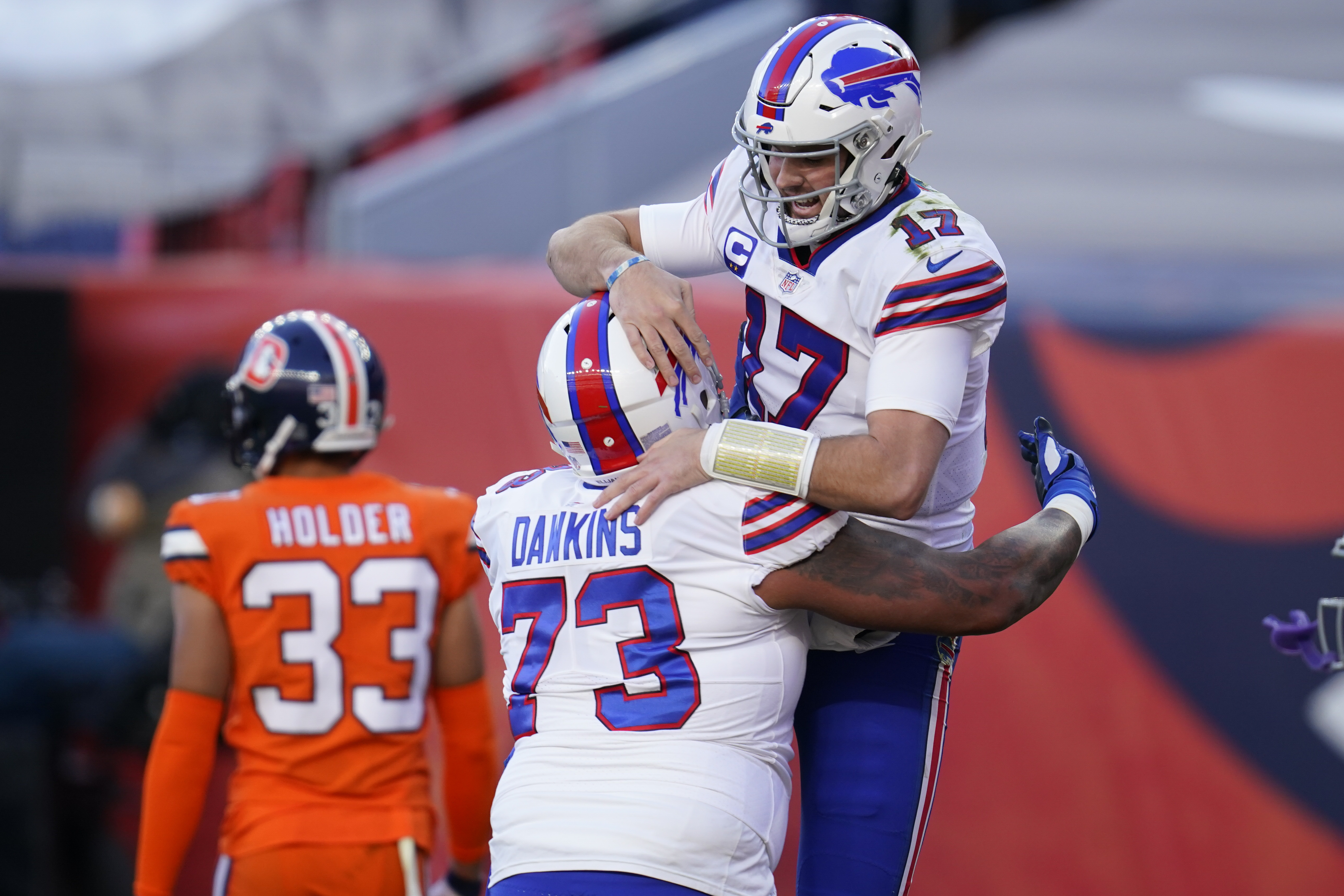 Buffalo Bills tackle Dion Dawkins (73) runs on the field during