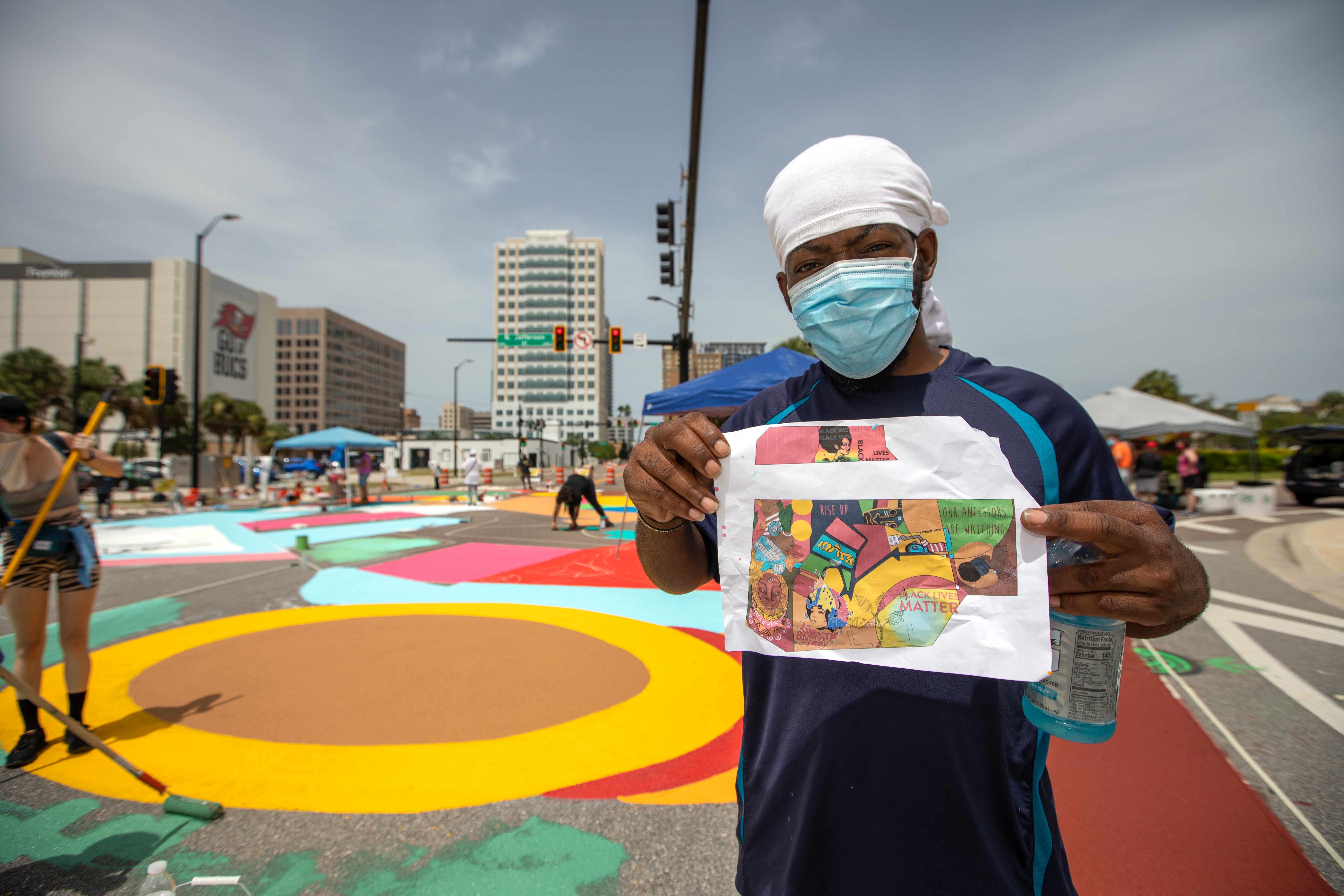 Painting the town during Tampa s Art on the Block Mural Day