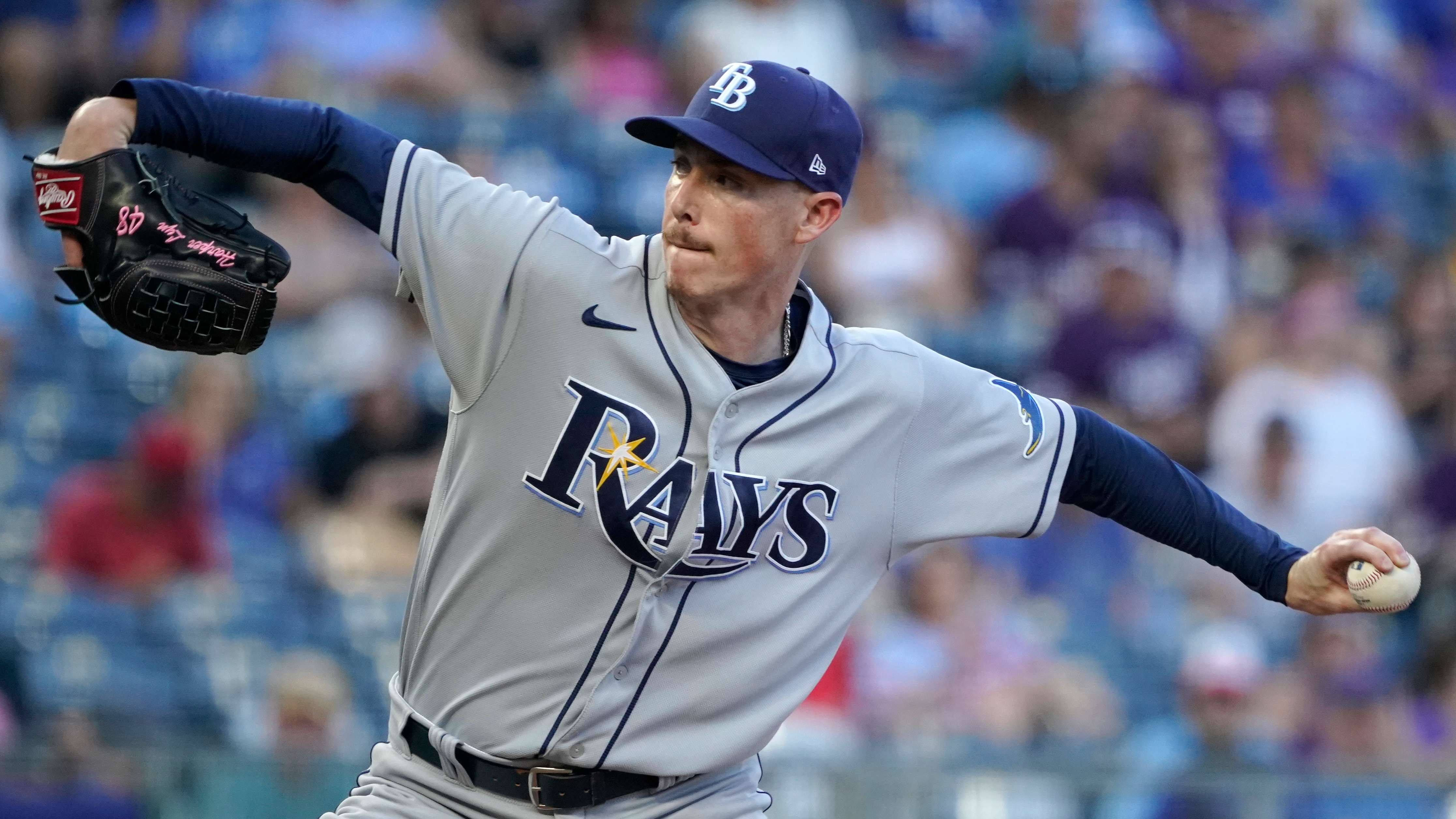 Tampa Bay Rays' Roman Quinn, right, stands on third base after hitting a  two-run triple in the seventh inning against the Kansas City Royals during  a baseball game Saturday, July 23, 2022