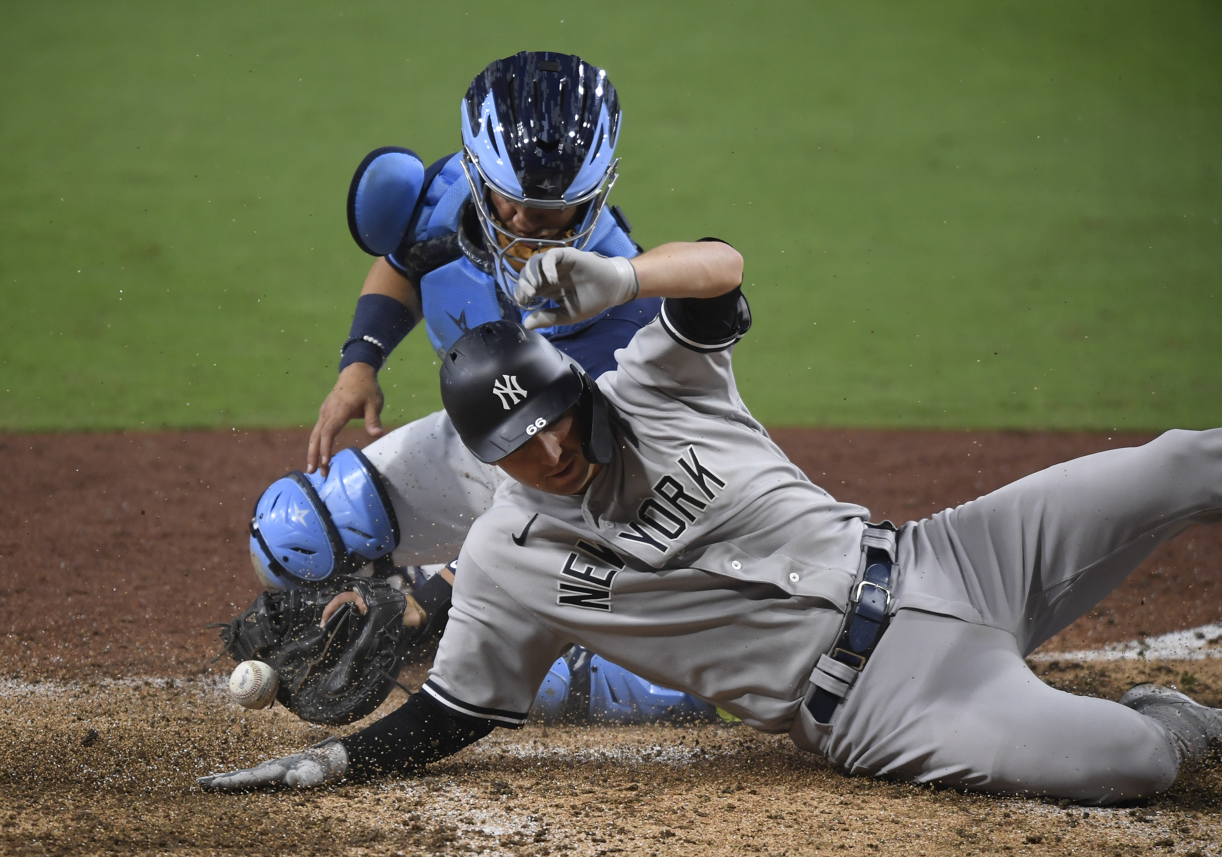 New York Yankees catcher Kyle Higashioka (66) warms up during a