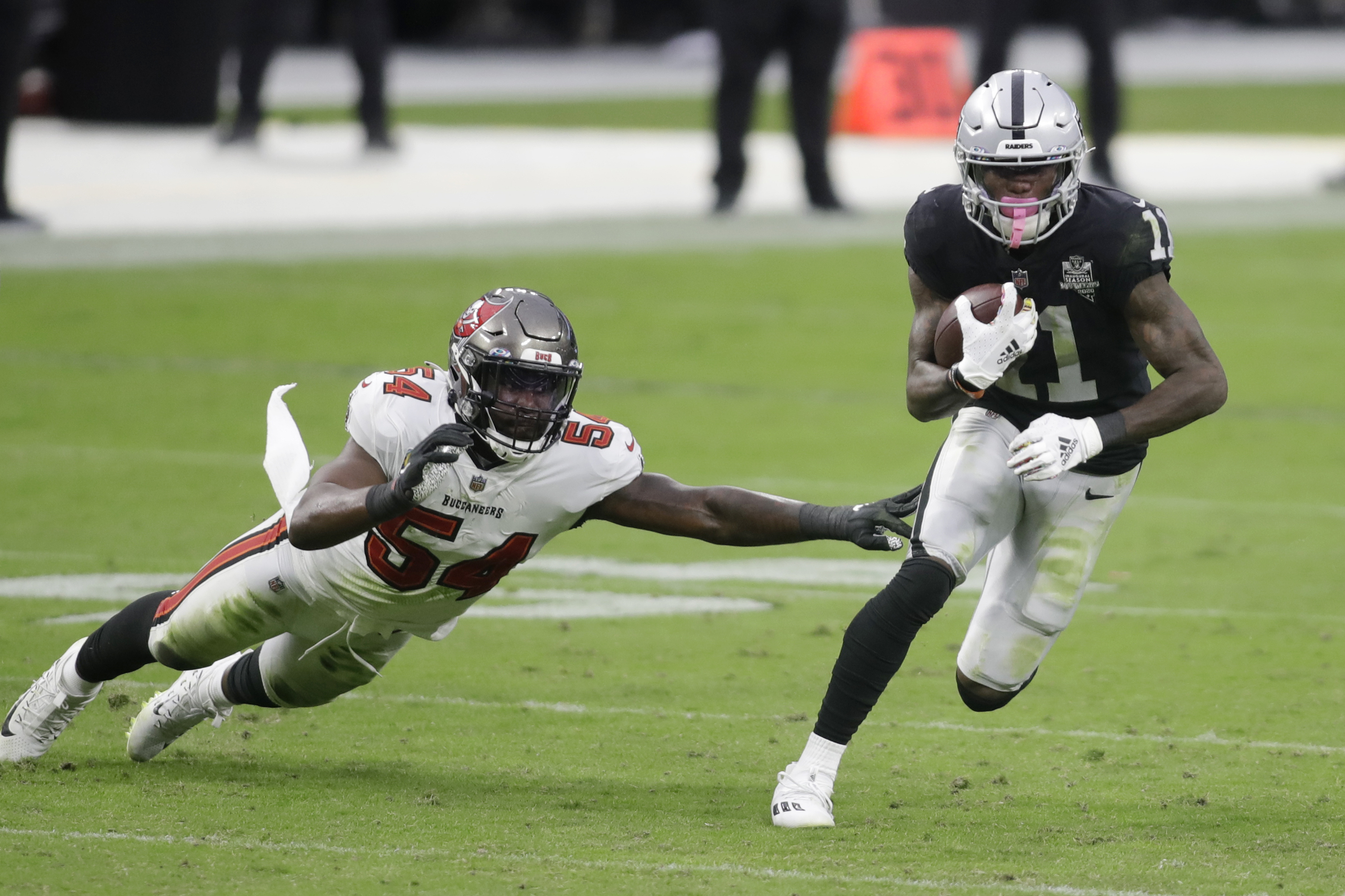 Brady's 4 touchdown passes lead Tampa Bay past Raiders 45-20