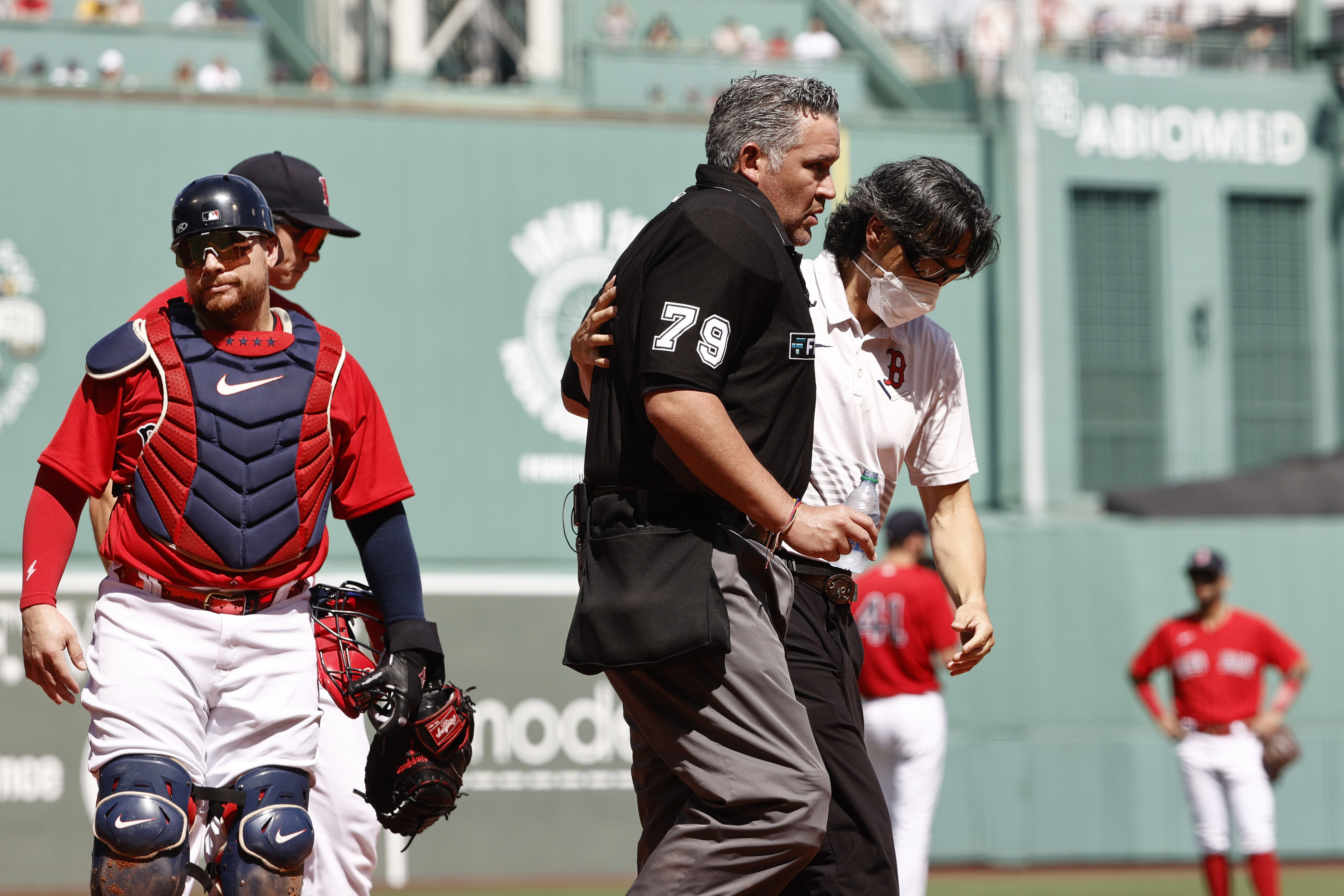 Boston's Christian Vazquez uses catcher's mask to stop ball