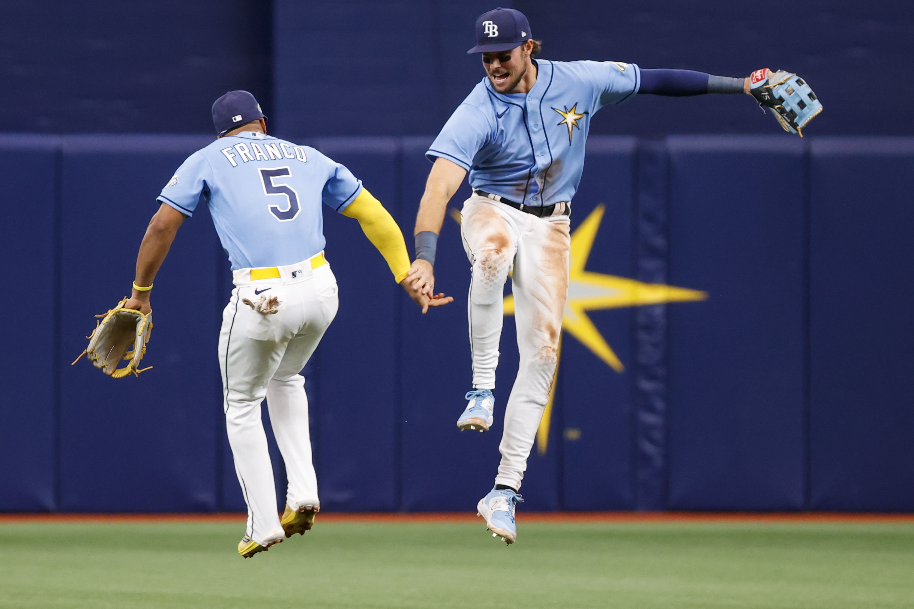 Tampa Bay Rays outfielder Carl Crawford connects for a solo home