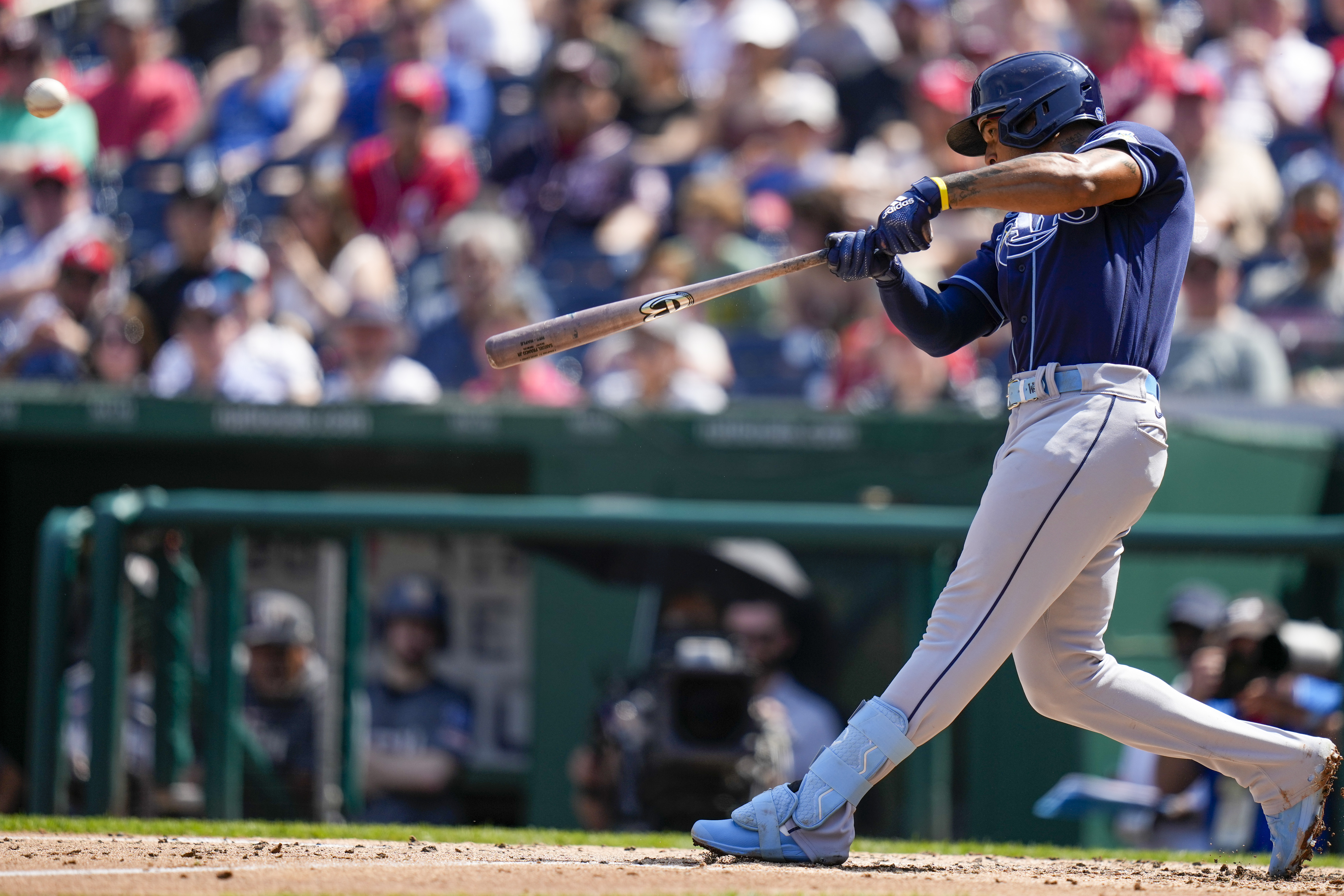 Washington Nationals shortstop CJ Abrams (5) looks to throw to first base  during a baseball game against the Detroit Tigers at Nationals Park,  Friday, May 19, 2023, in Washington. (AP Photo/Alex Brandon