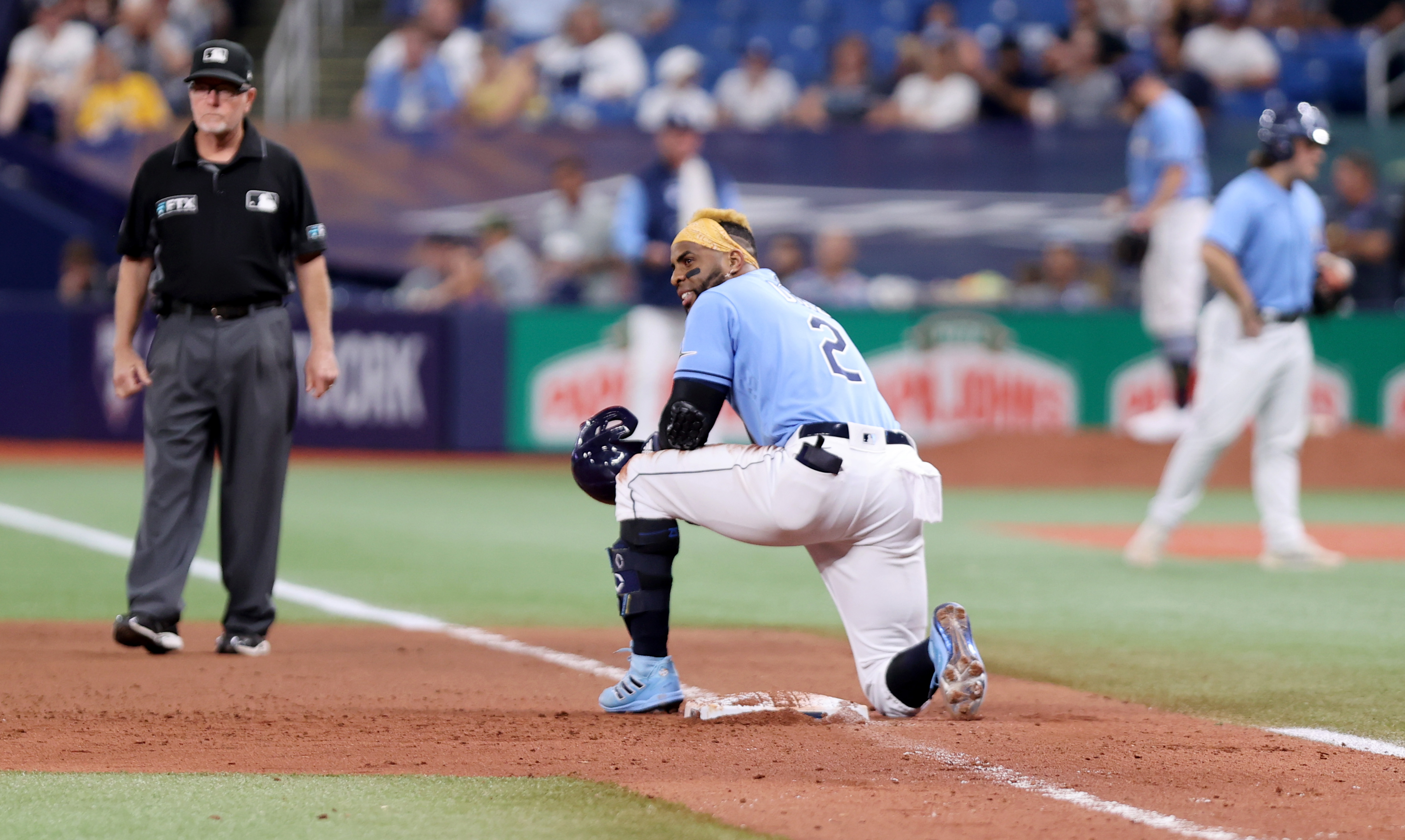 Tampa Bay Rays left fielder Randy Arozarena leaps in vain to make