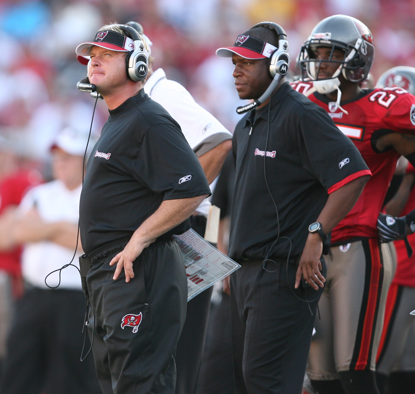 13 SEP 2009: Head Coach Raheem Morris of the Buccaneers in the red shirt  watches the instant replay during the game between the Dallas Cowboys and  the Tampa Bay Buccaneers at Raymond