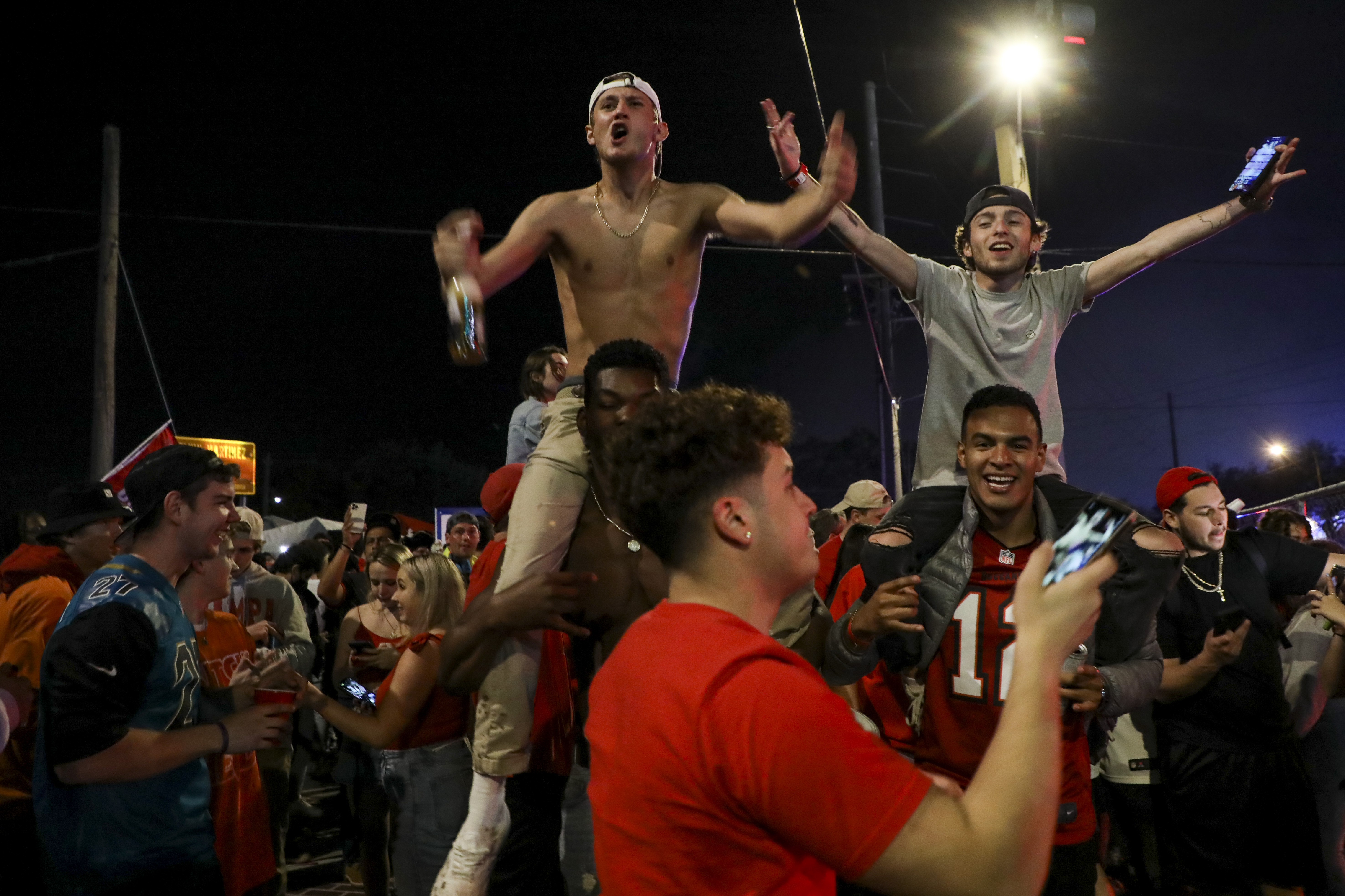 Bucs fans celebrate Super Bowl win outside Raymond James and