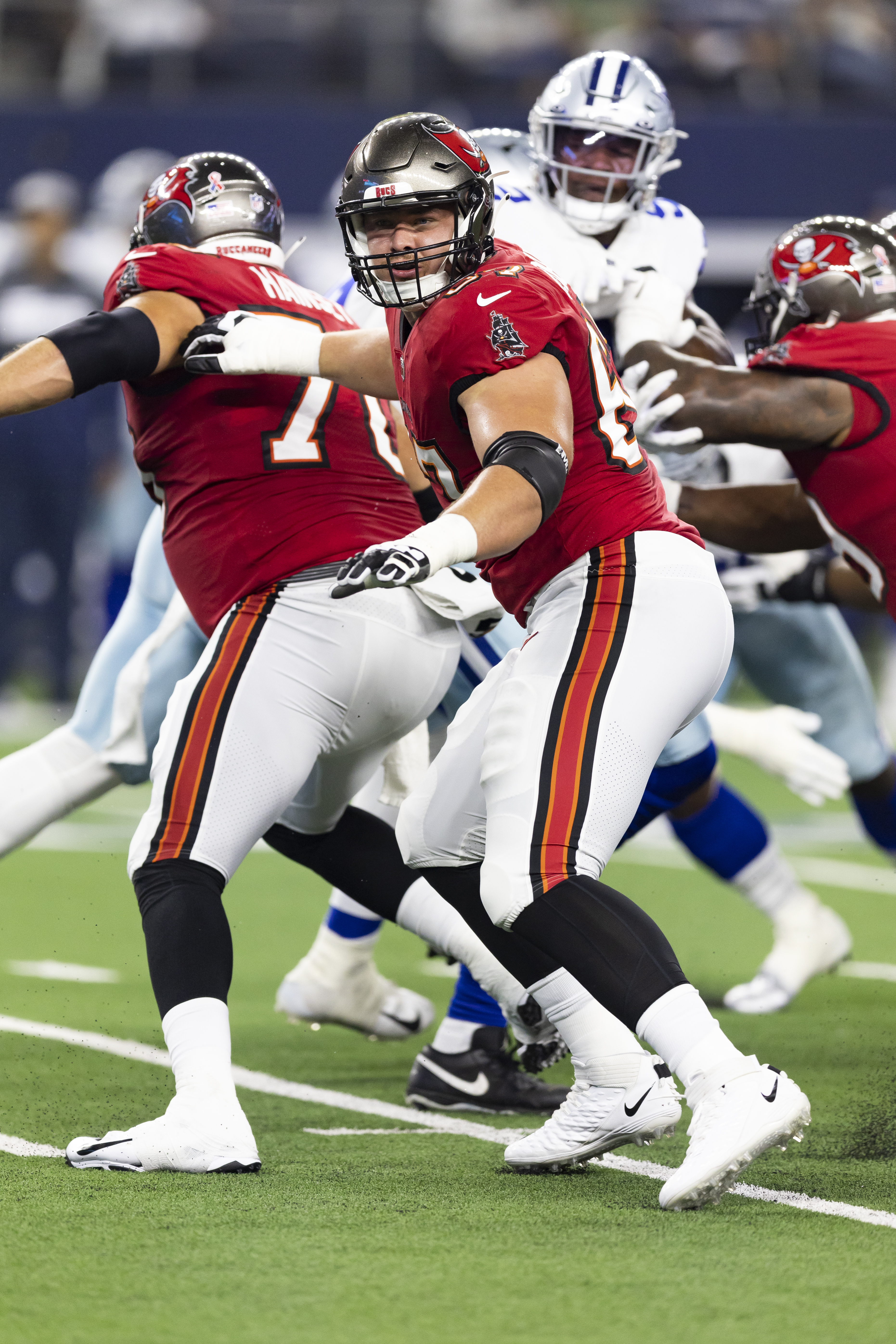 Tampa Bay Buccaneers guard Luke Goedeke (67) lines up during the first half  of an NFL football game against the Atlanta Falcons, Sunday, Jan. 8, 2023,  in Atlanta. The Atlanta Falcons won