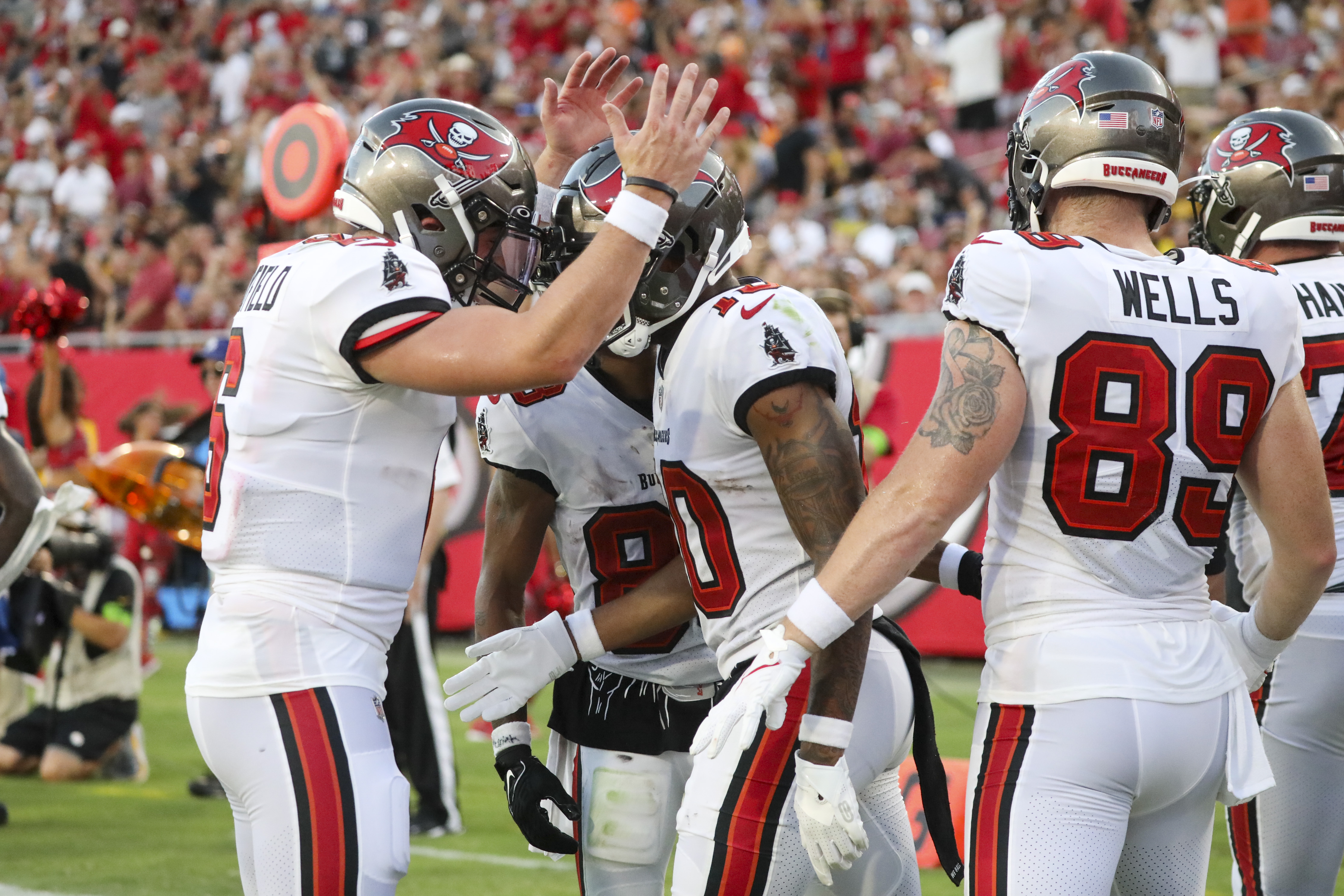 Bucs receiver Russell Gage is carted off the field in Tampa Bay