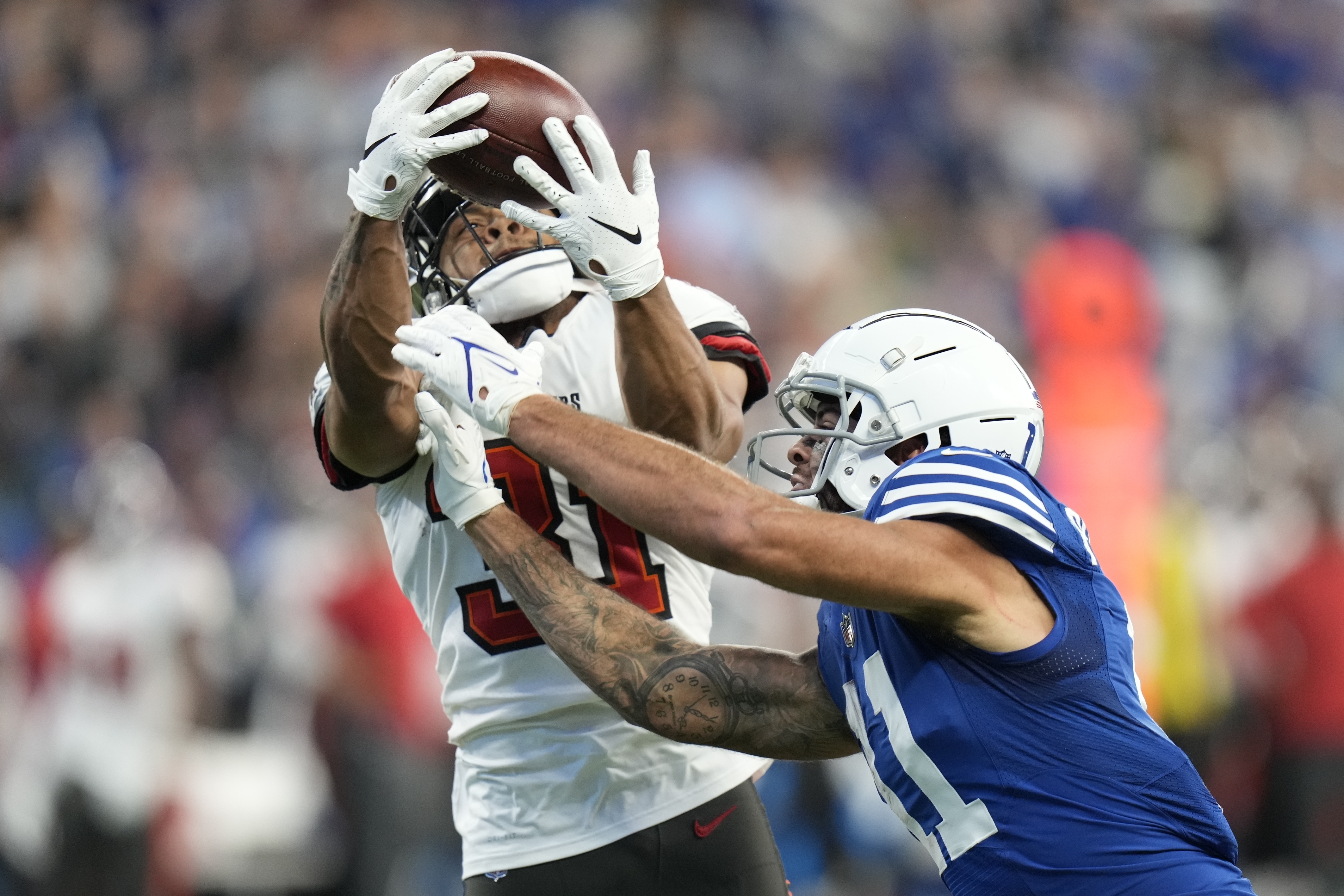 Indianapolis Colts wide receiver T.Y. Hilton (13) makes a touchdown catch  under pressure from R …