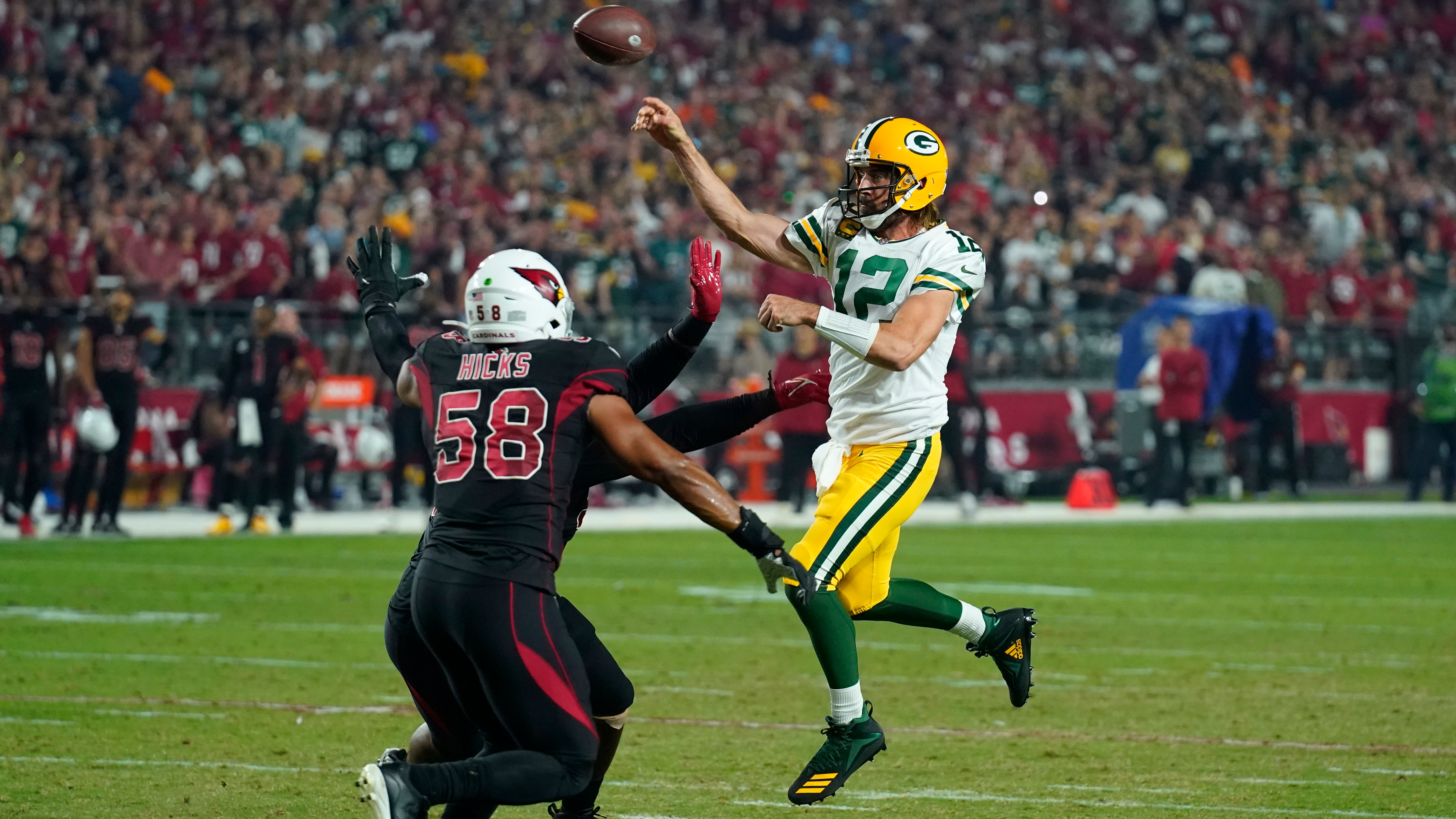 Watch: Aaron Rodgers Throws Ball 50 Yards Into Hoop - Sports