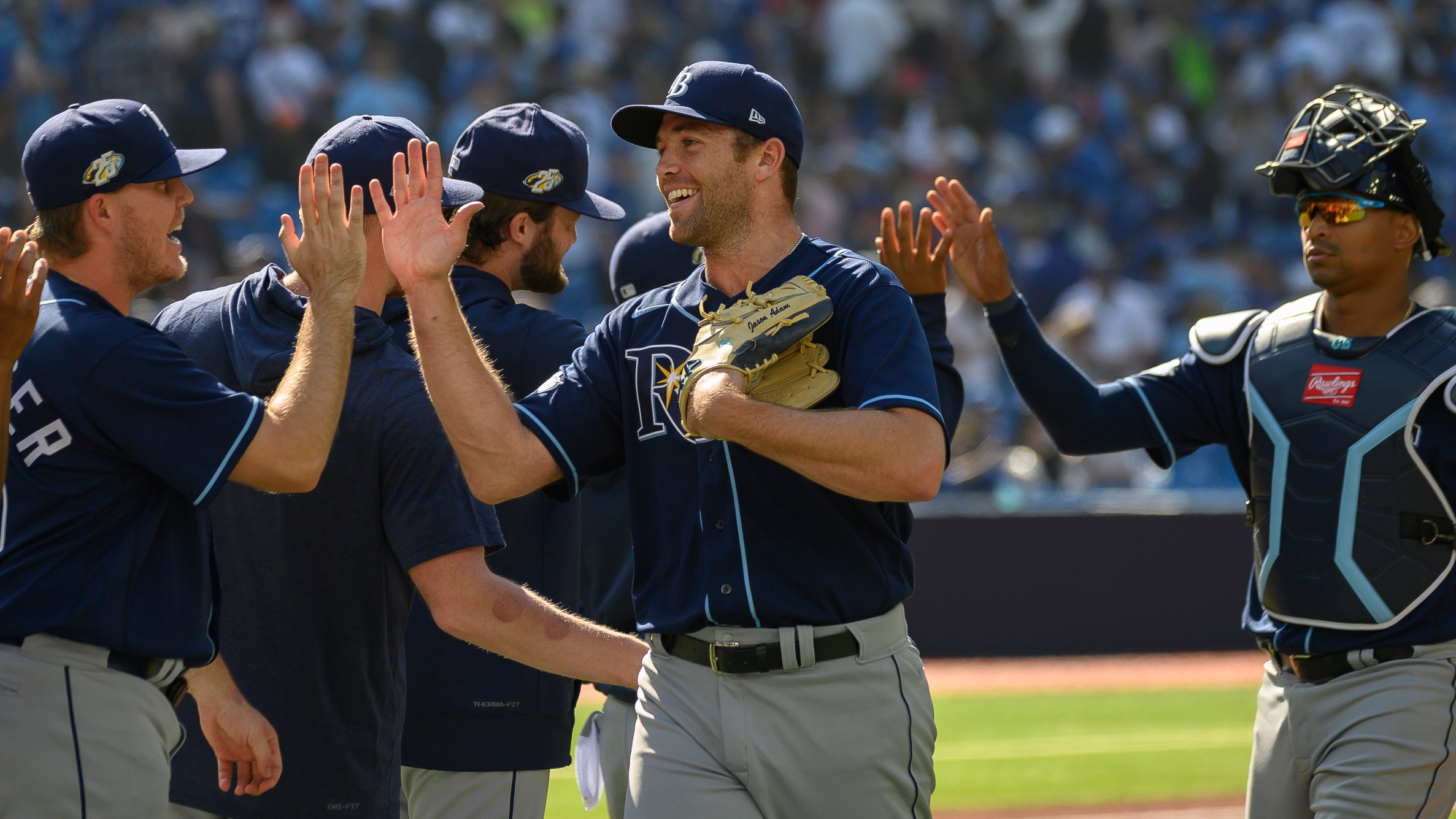 Tampa Bay Rays pitcher Jason Adam, left, and catcher Christian