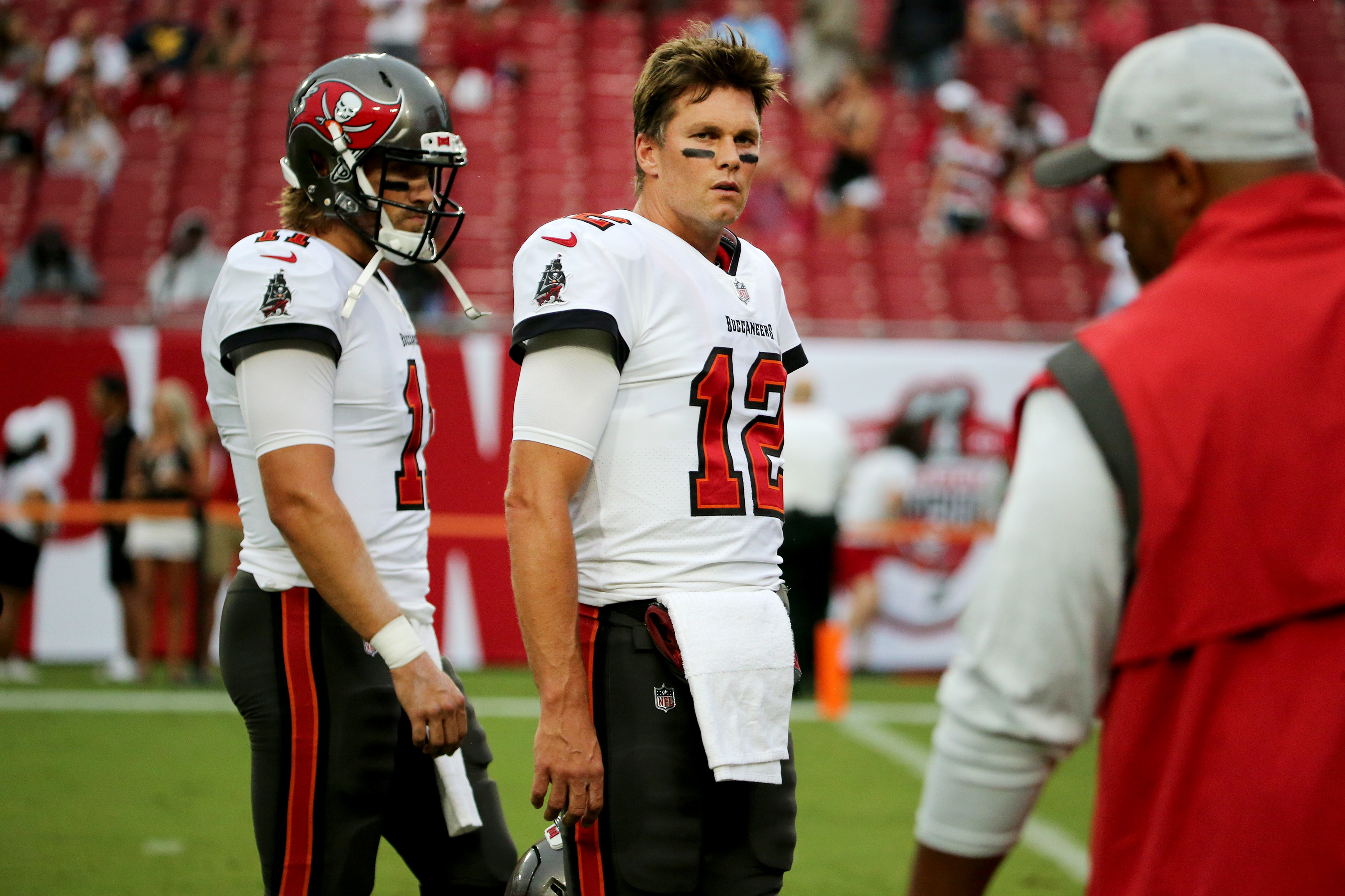 Cincinnati Bengals defensive end Joseph Ossai drops Tampa Bay Buccaneers  quarterback Tom Brady for his first preseason sack