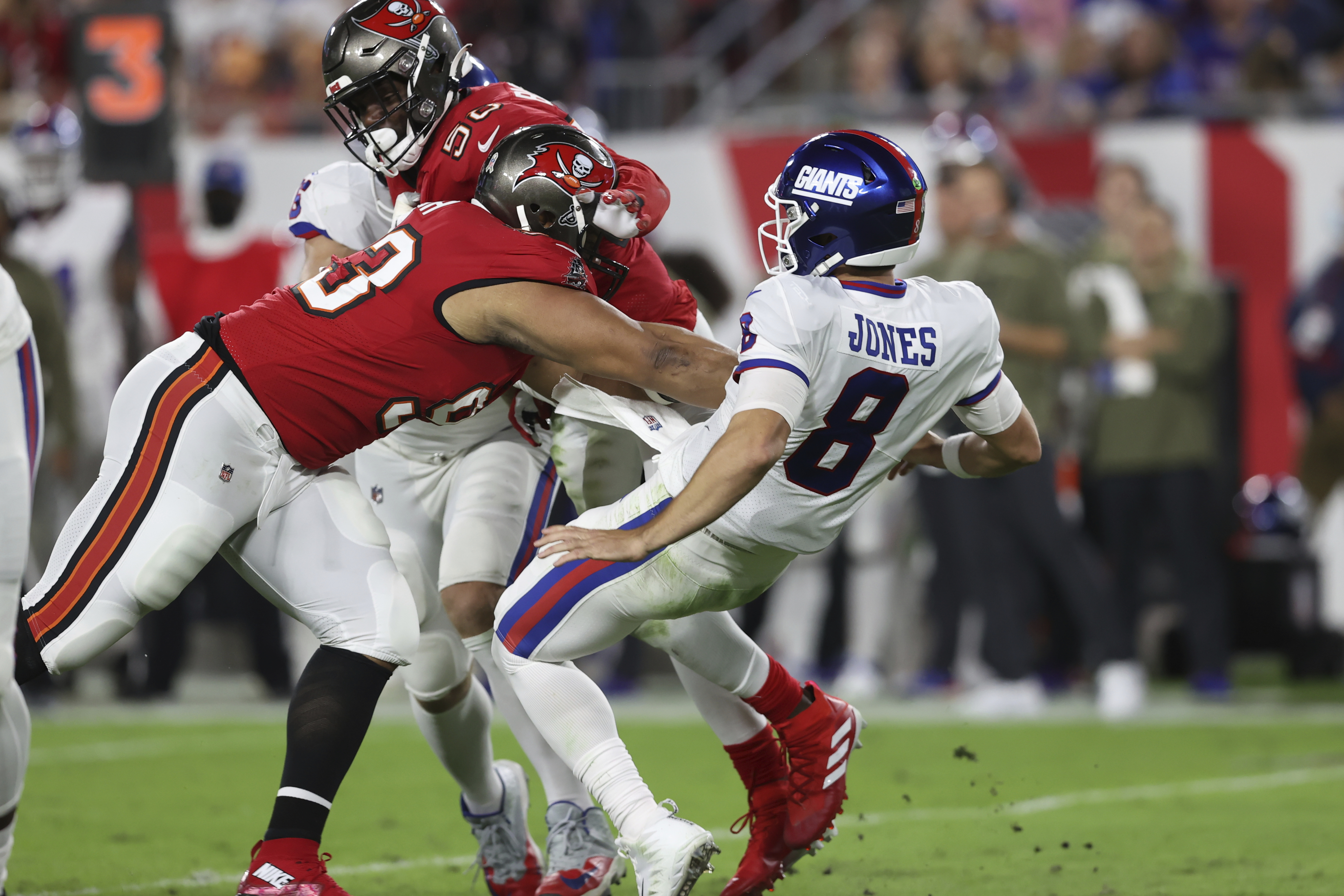 New York Giants defensive back Darnay Holmes (30) celebrates with teammates  after making an int …