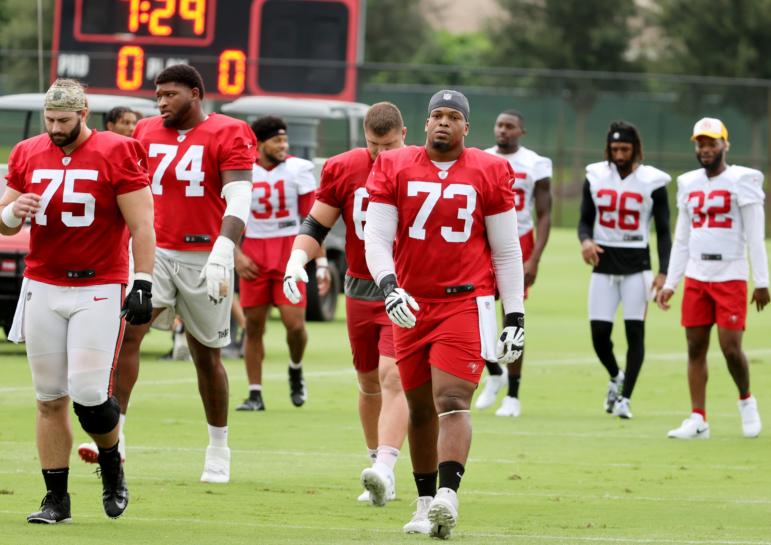 Tampa Bay Buccaneers offensive tackle Brandon Walton (73) walks