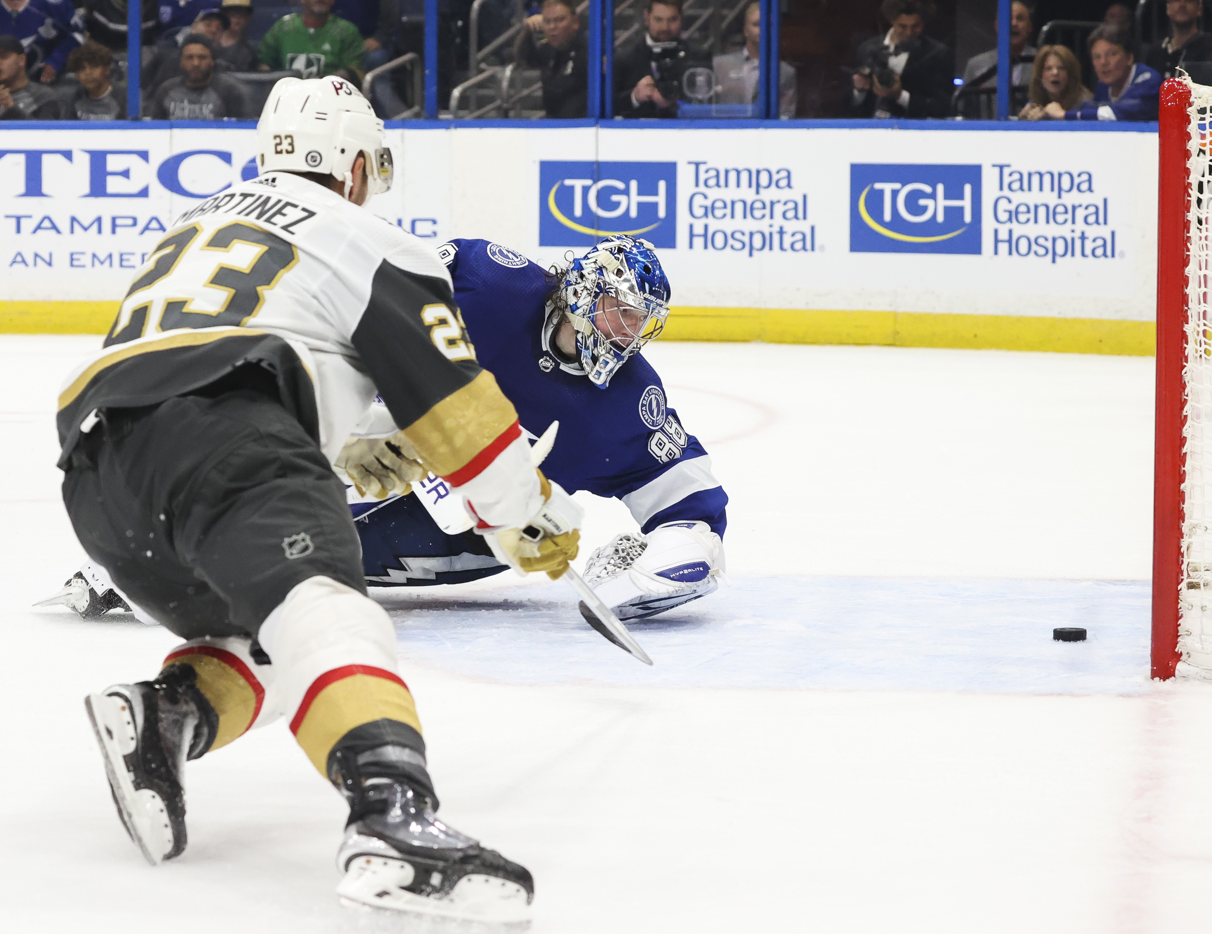 Vegas Golden Knights' Alec Martinez (23) saves a shot in front of