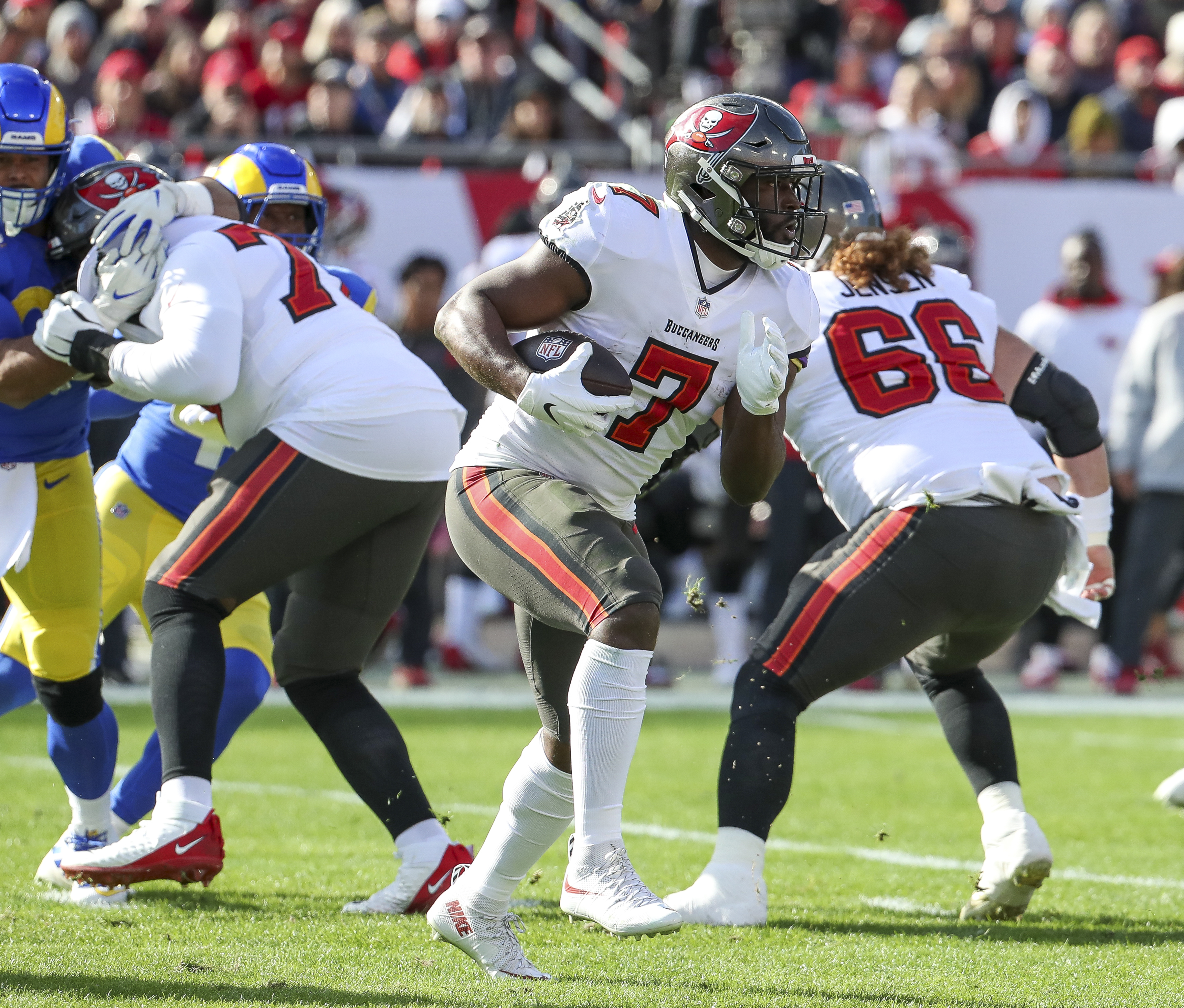 Tampa Bay Buccaneers guard Alex Cappa (65) reacts to the snap during a NFL  divisional playoff f …