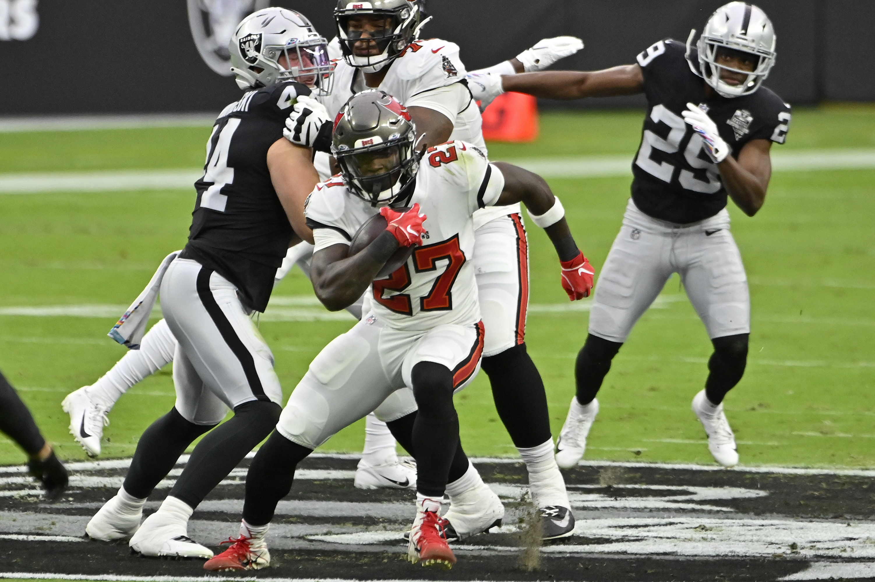 Tampa Bay Buccaneers safety Mike Edwards (32) runs to the ball as