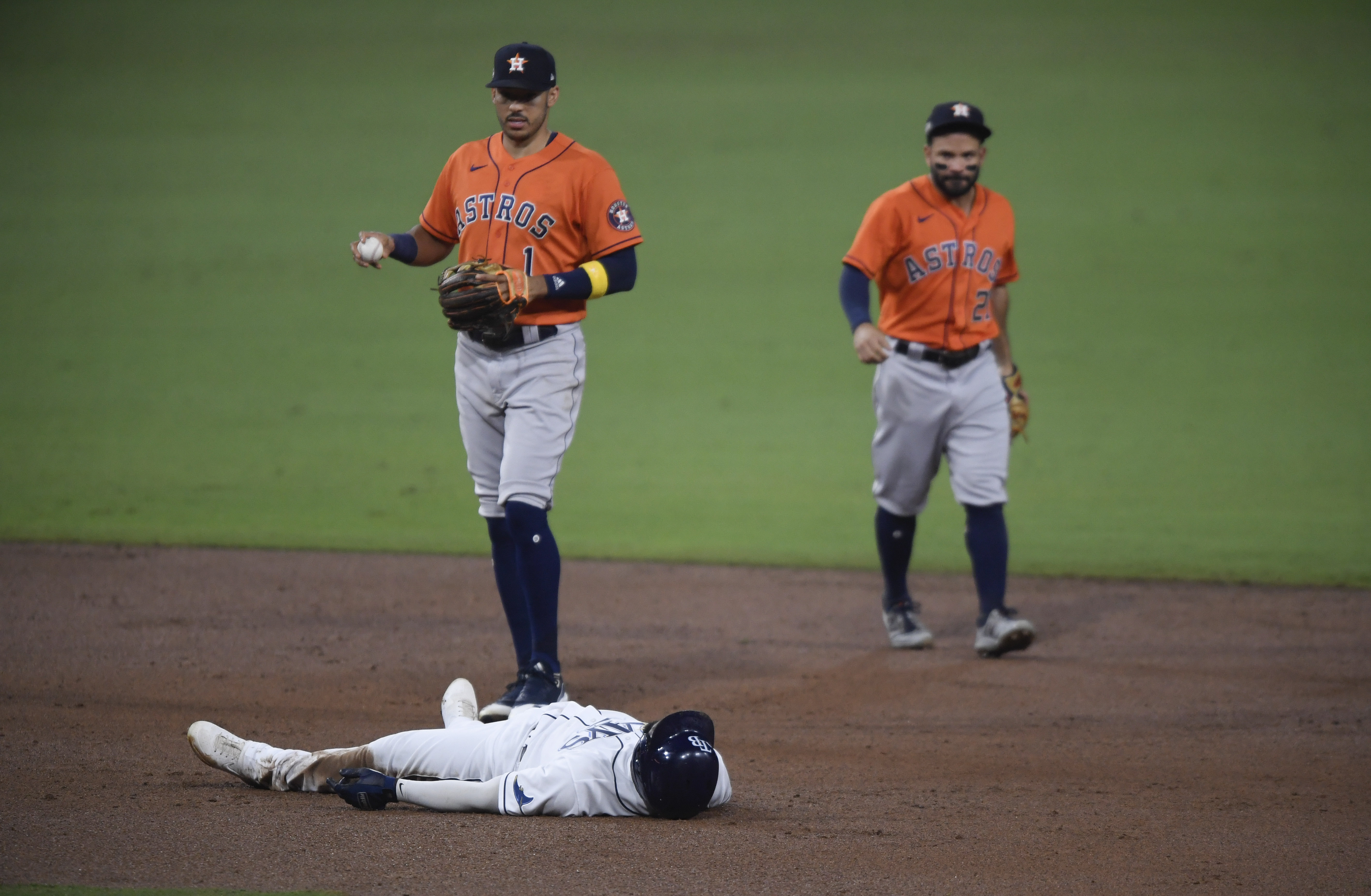 Houston Astros Carlos Correa is congratulated by Alex Bregman (after  hitting a solo home run Tampa Bay Rays relief pitcher Peter Fairbanks  during the sixth inning in Game 2 of a baseball