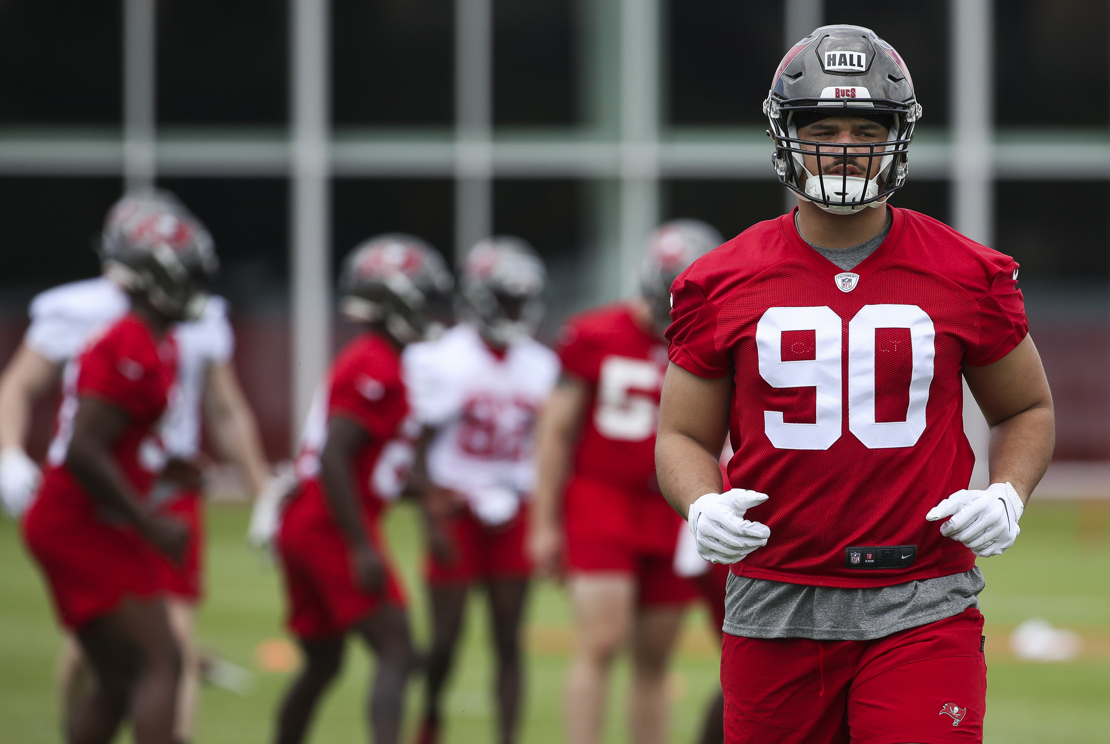 Tampa Bay Buccaneers select Houston DL Logan Hall with the 33rd pick.  Grade: B