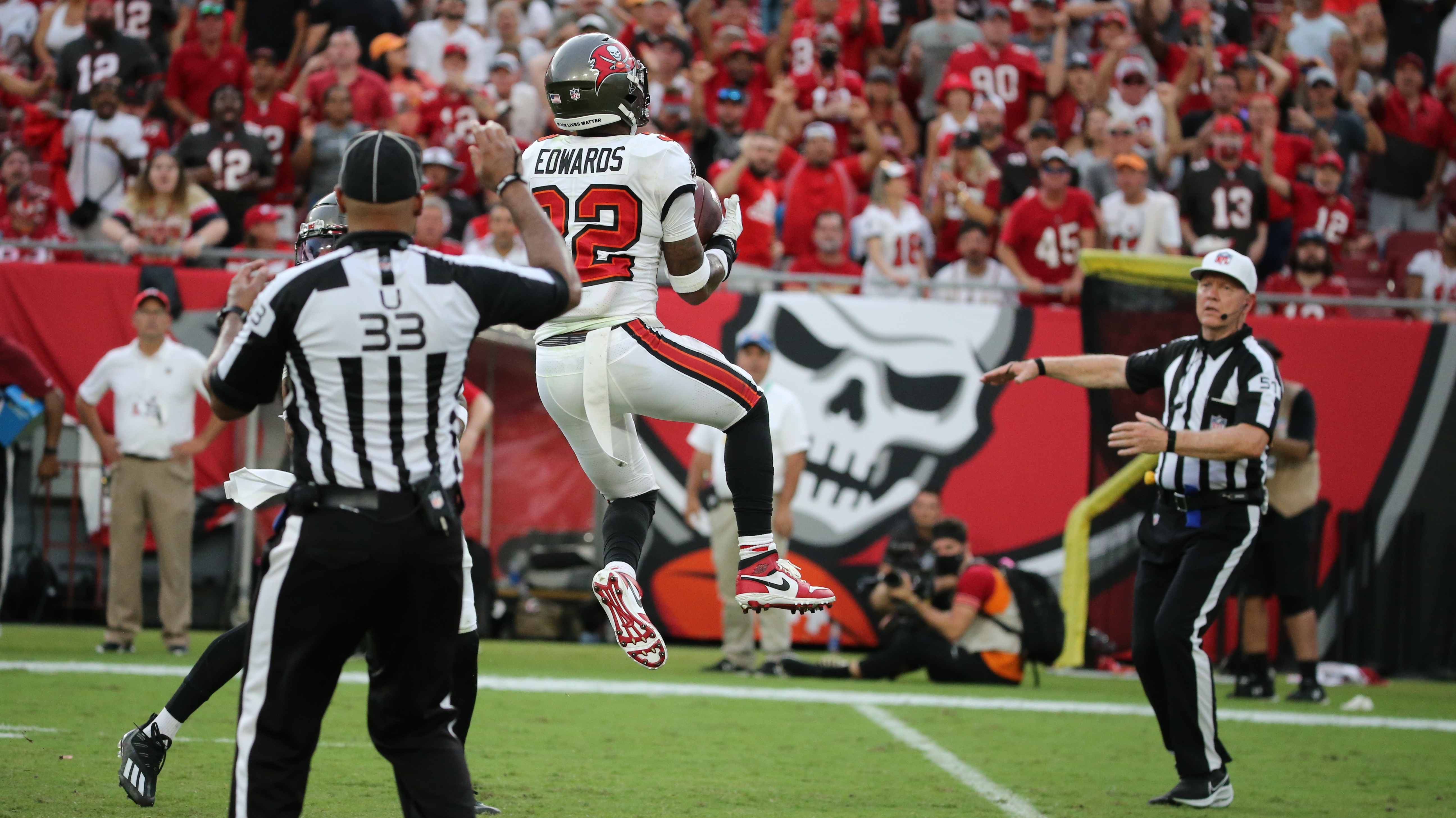 Tampa Bay Buccaneers safety Mike Edwards (32) runs to the ball as