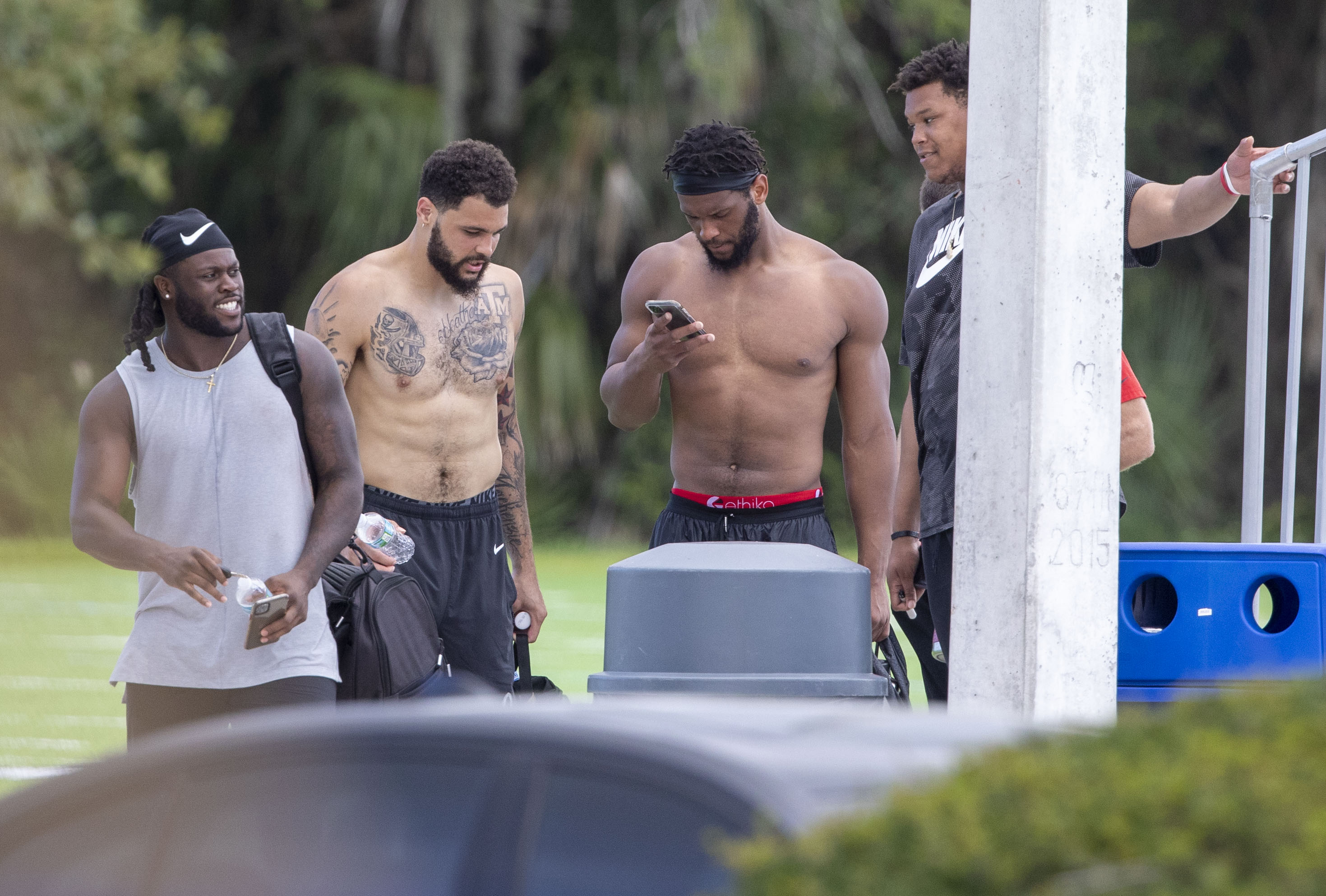 Tom Brady, Bucs players take the field at Tampa's Berkeley Prep