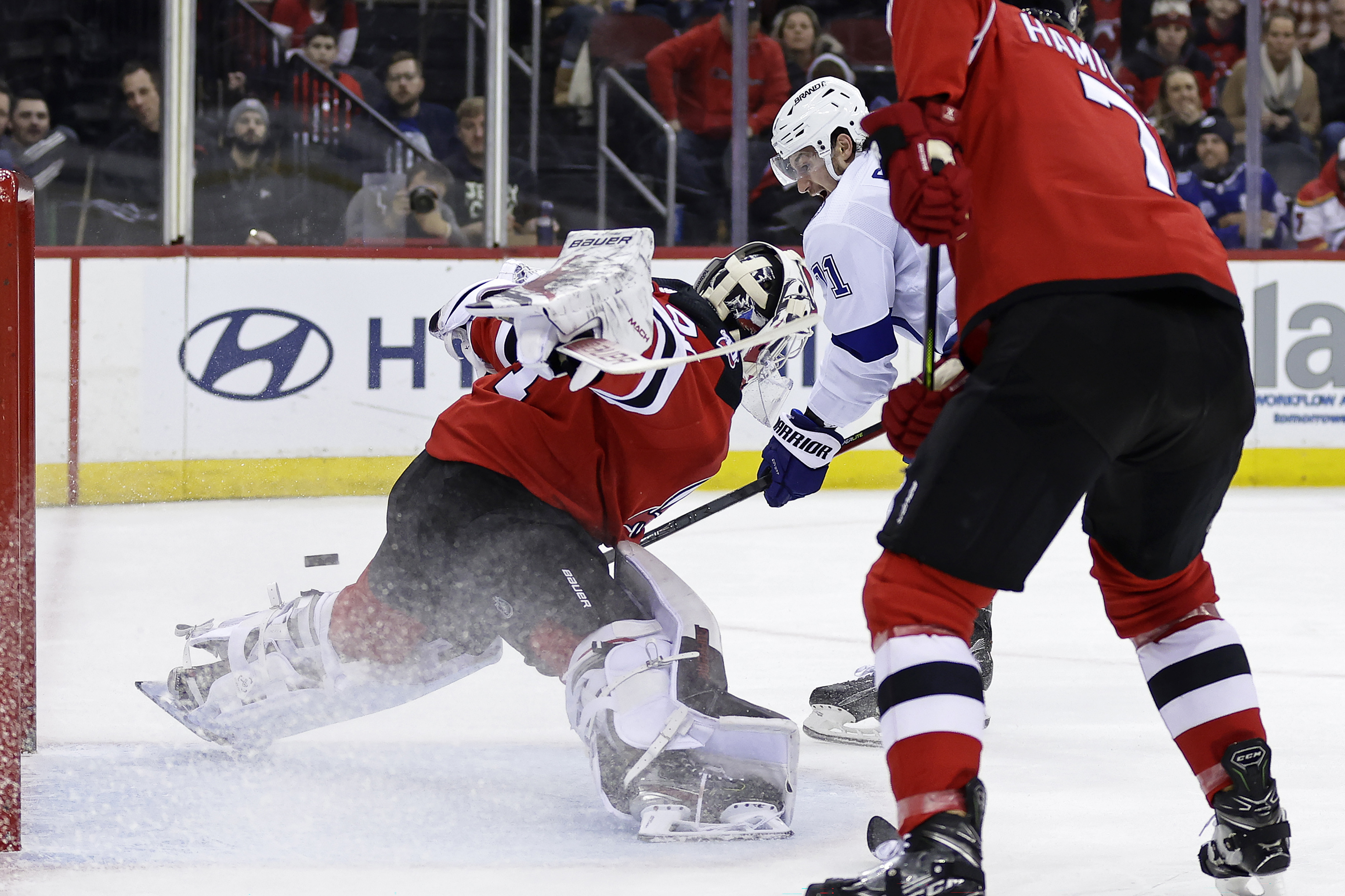 Lightning beat Devils 4-1 to open 2-game set in New Jersey