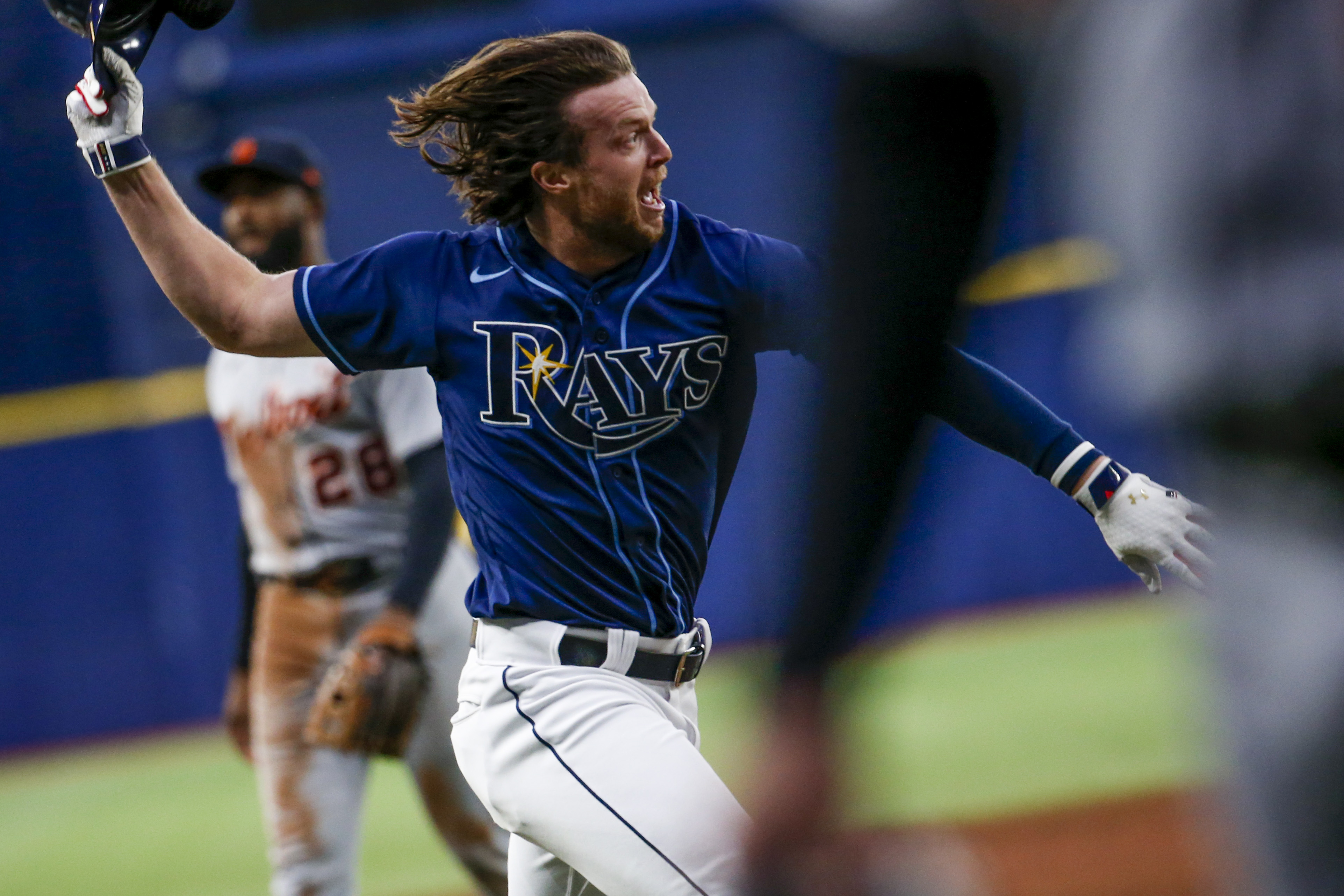 Phillips homers in 10th as Rays rally to beat Tigers 7-4