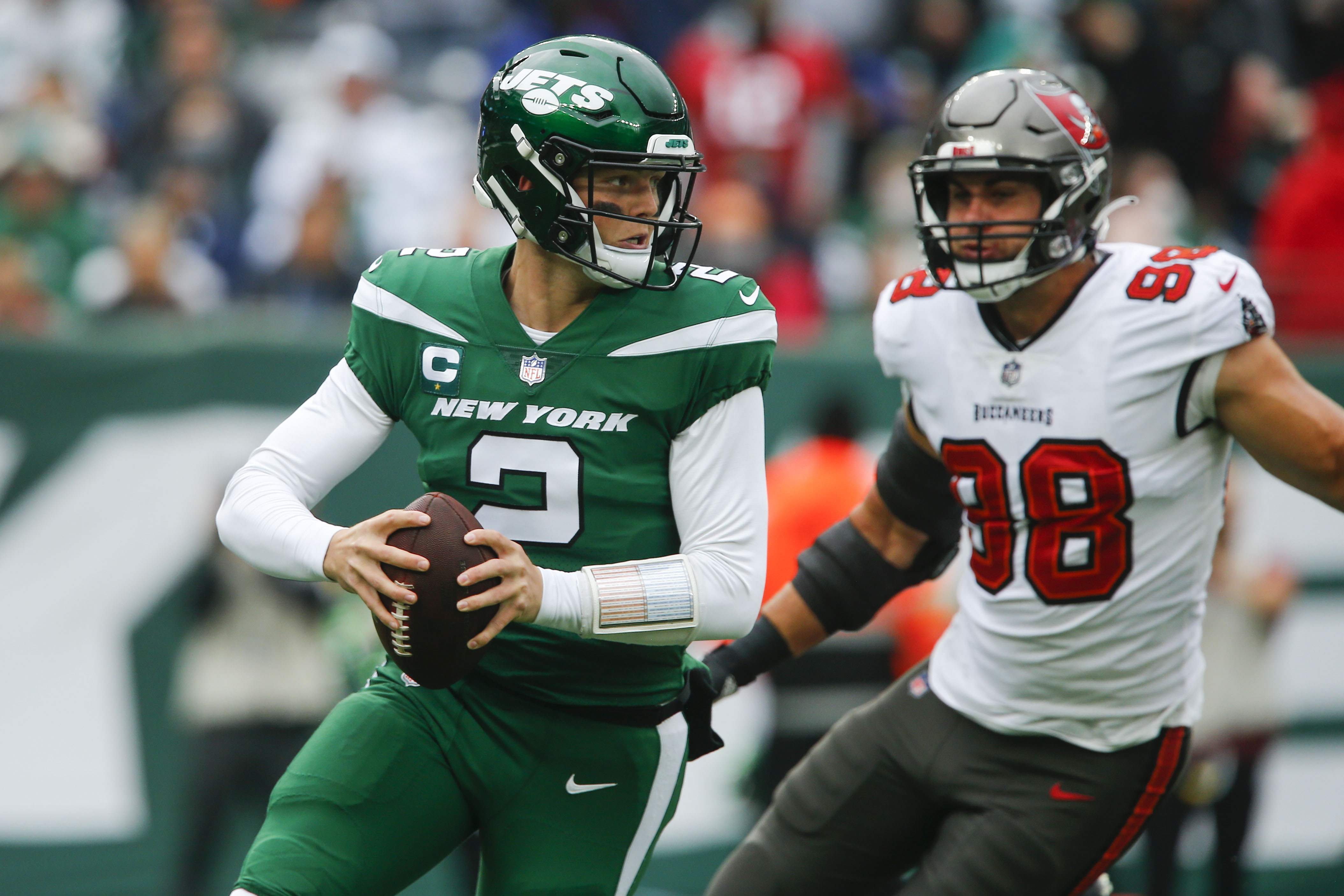 New York Jets running back Michael Carter (32) warms up before taking on  the Miami Dolphins during an NFL football game Sunday, Oct. 9, 2022, in  East Rutherford, N.J. (AP Photo/Adam Hunger