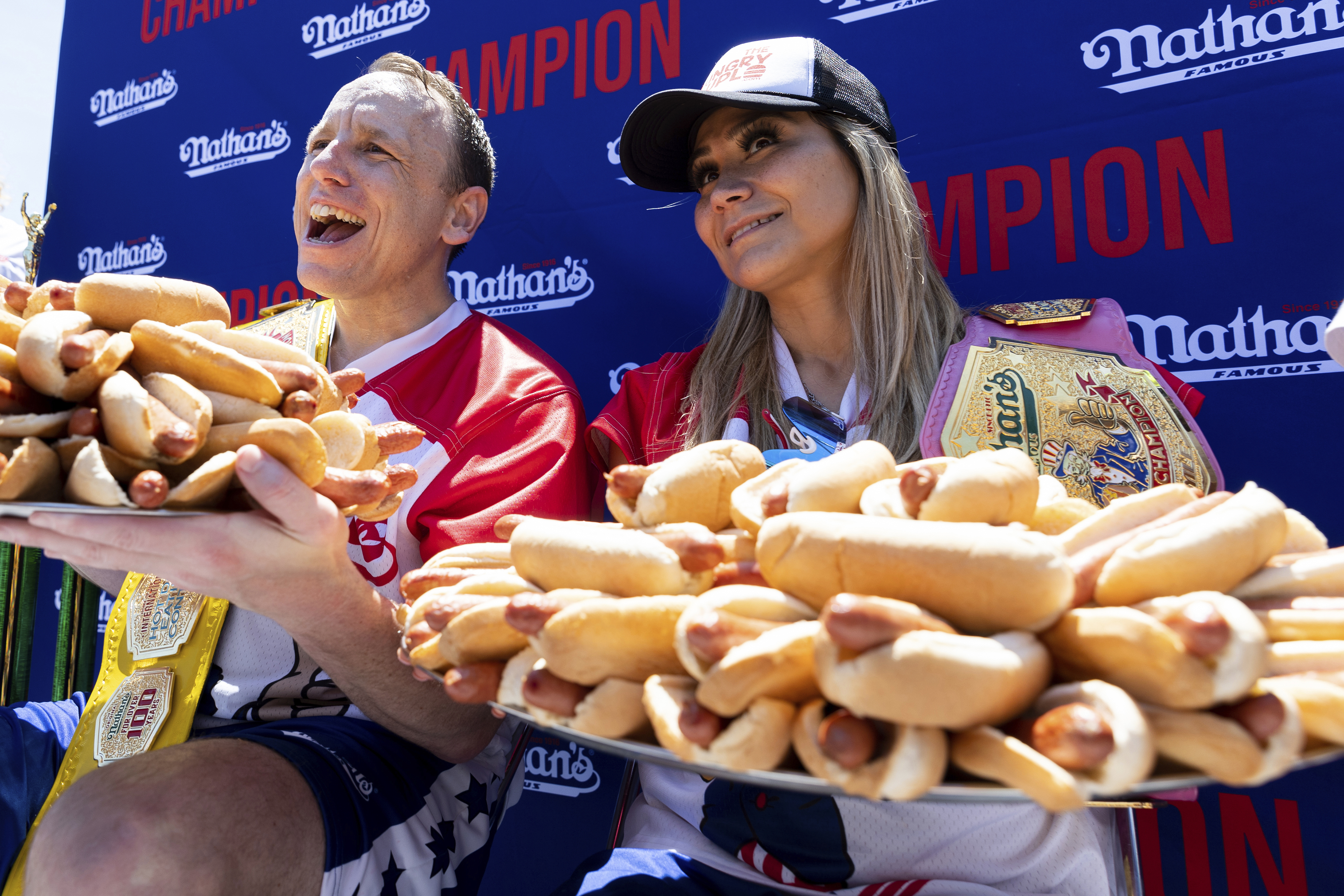 Woman eats poutine hot dog each Toronto Blue Jays run