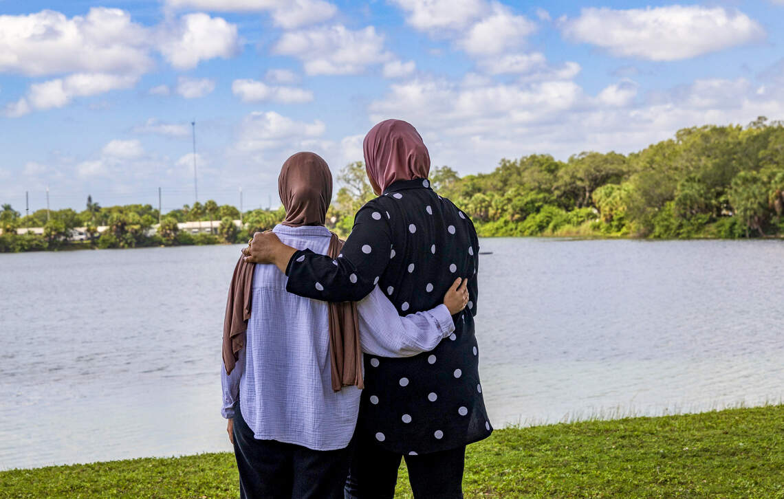 Faten (left), a former Florida Atlantic University student who was 10 credits away from graduating when Florida ended in-state tuition for undocumented students, stands with her mother. She had to end her studies because her family couldn’t afford out-of-