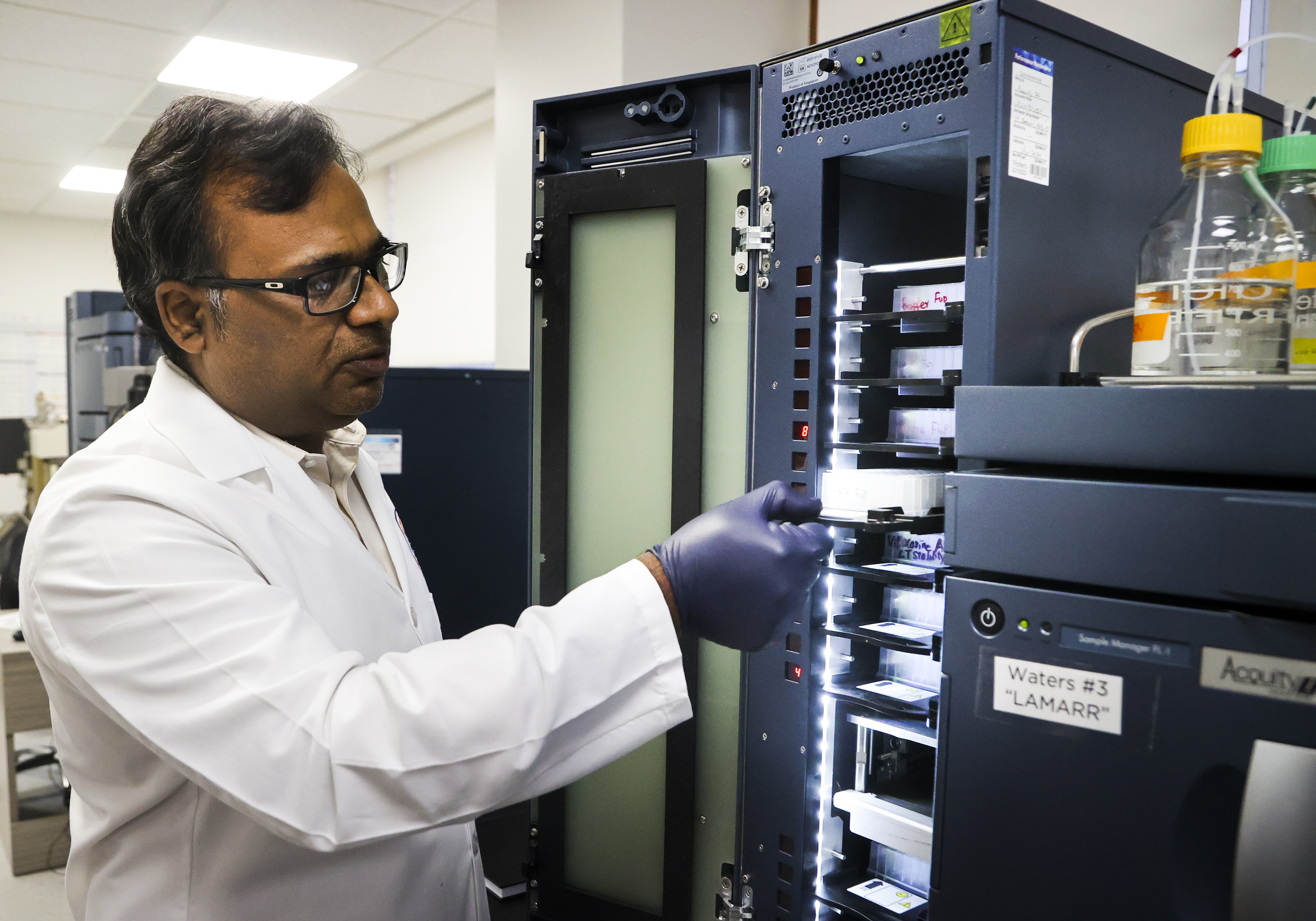 University of Florida researcher Abhisheak Sharma, seen here with
                                    testing equipment, is concerned about highly concentrated kratom
                                    products