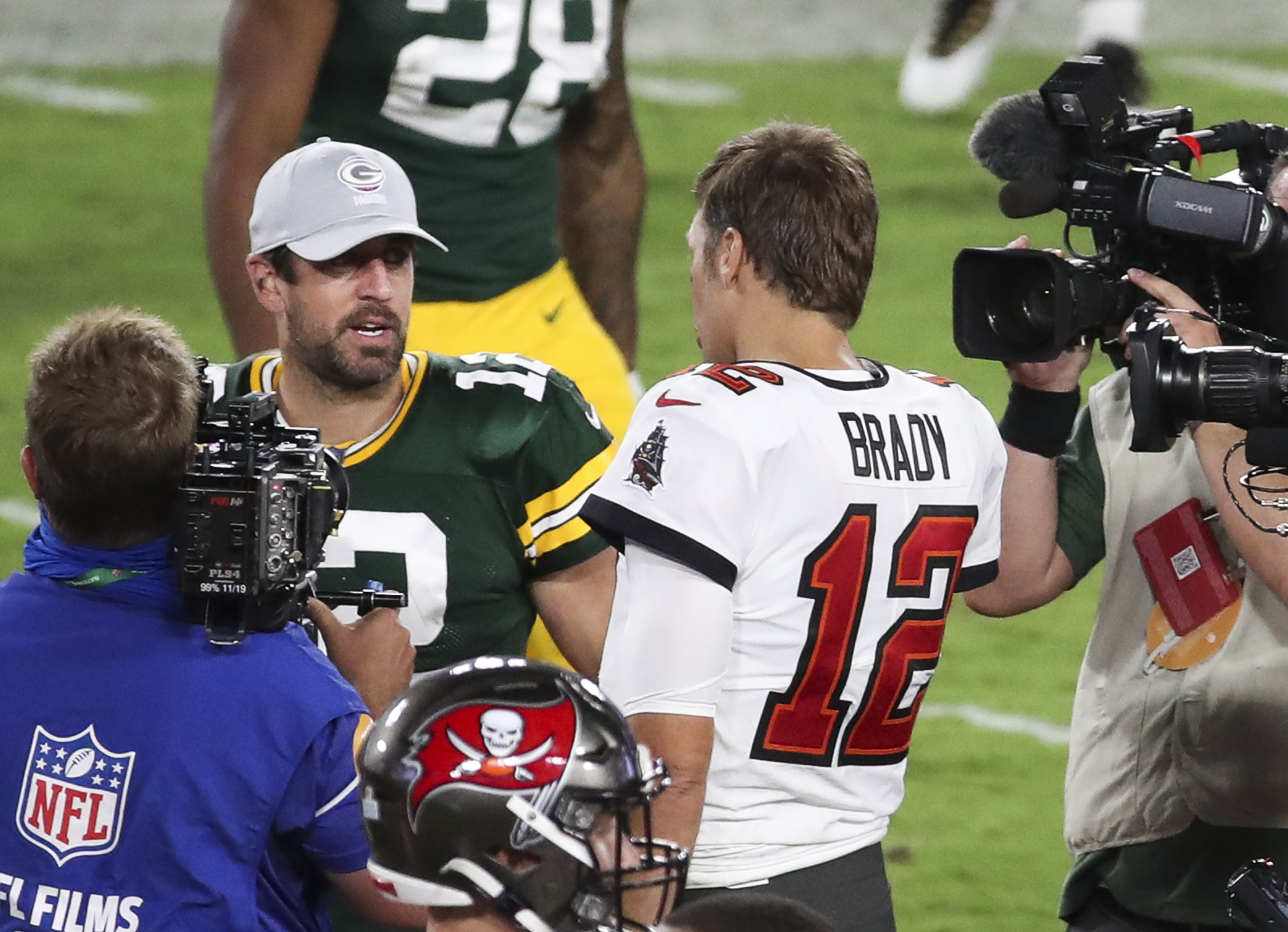 Is the pressure on Tom Brady  or Aaron Rodgers?