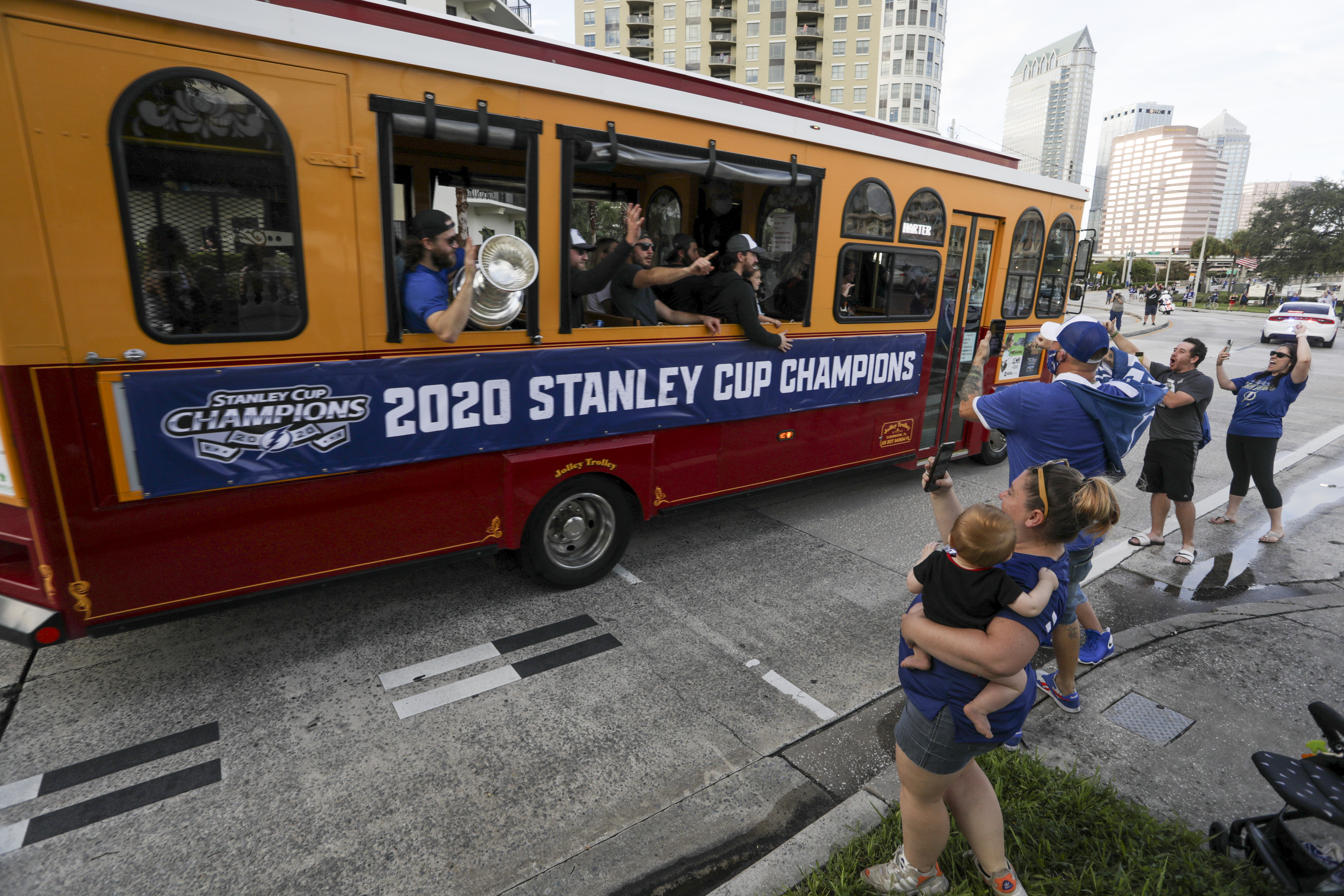 The Tampa Bay Lightning team returns to downtown Tampa in a trolleybus along Bayshore Boulevard bringing home the Stanley Cup on Tuesday, September 29, 2020. 
