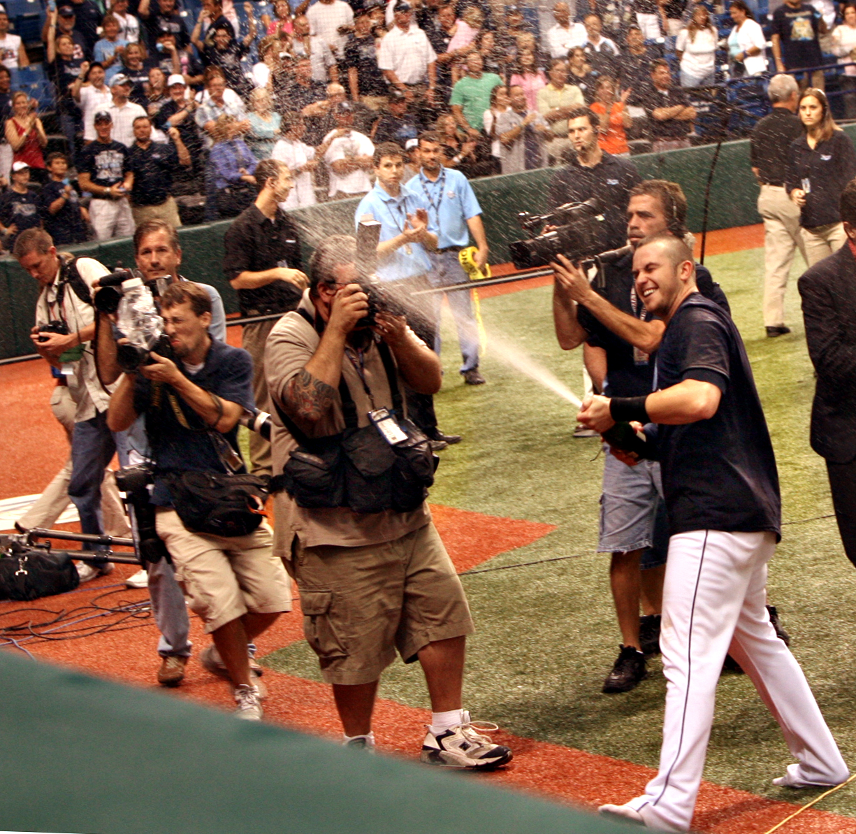 Sellout Crowd Braves Two Lightning Delays in Weather-Shortened